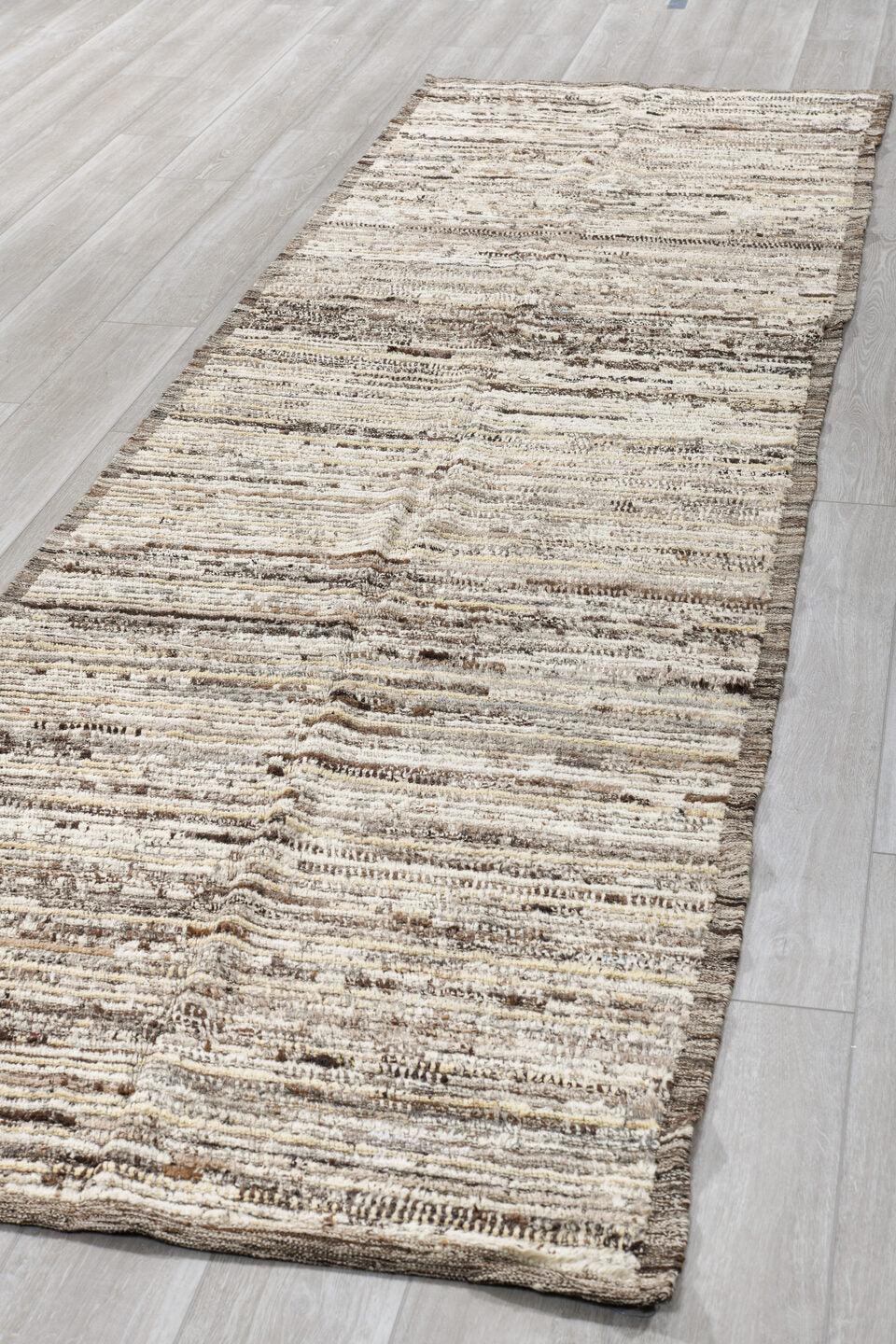 3' x 11' one-of-a-kind handmade vintage Tulu runner rug. Color palette: ivory, taupe, brown, charcoal, cream, beige, gray