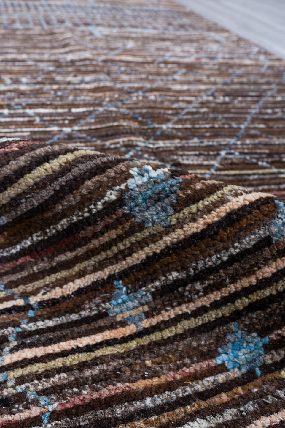2' x 10' one-of-a-kind handmade vintage Tulu runner rug. Color palette: brown, sky blue, ivory, charcoal, light blue, gray
