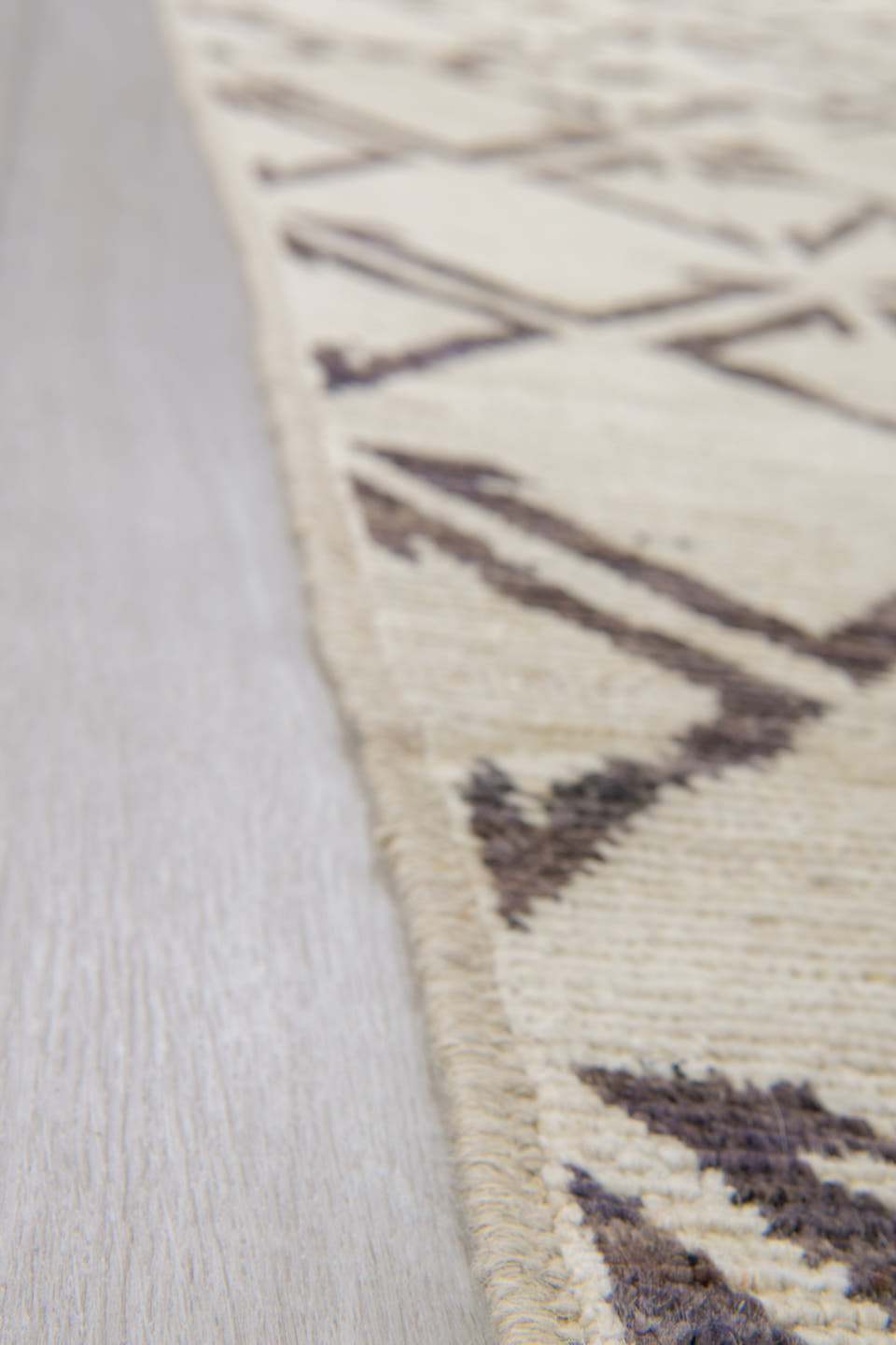 4' x 11' one-of-a-kind handmade vintage Tulu runner rug. Color palette: ivory, charcoal, taupe, black, gray, beige