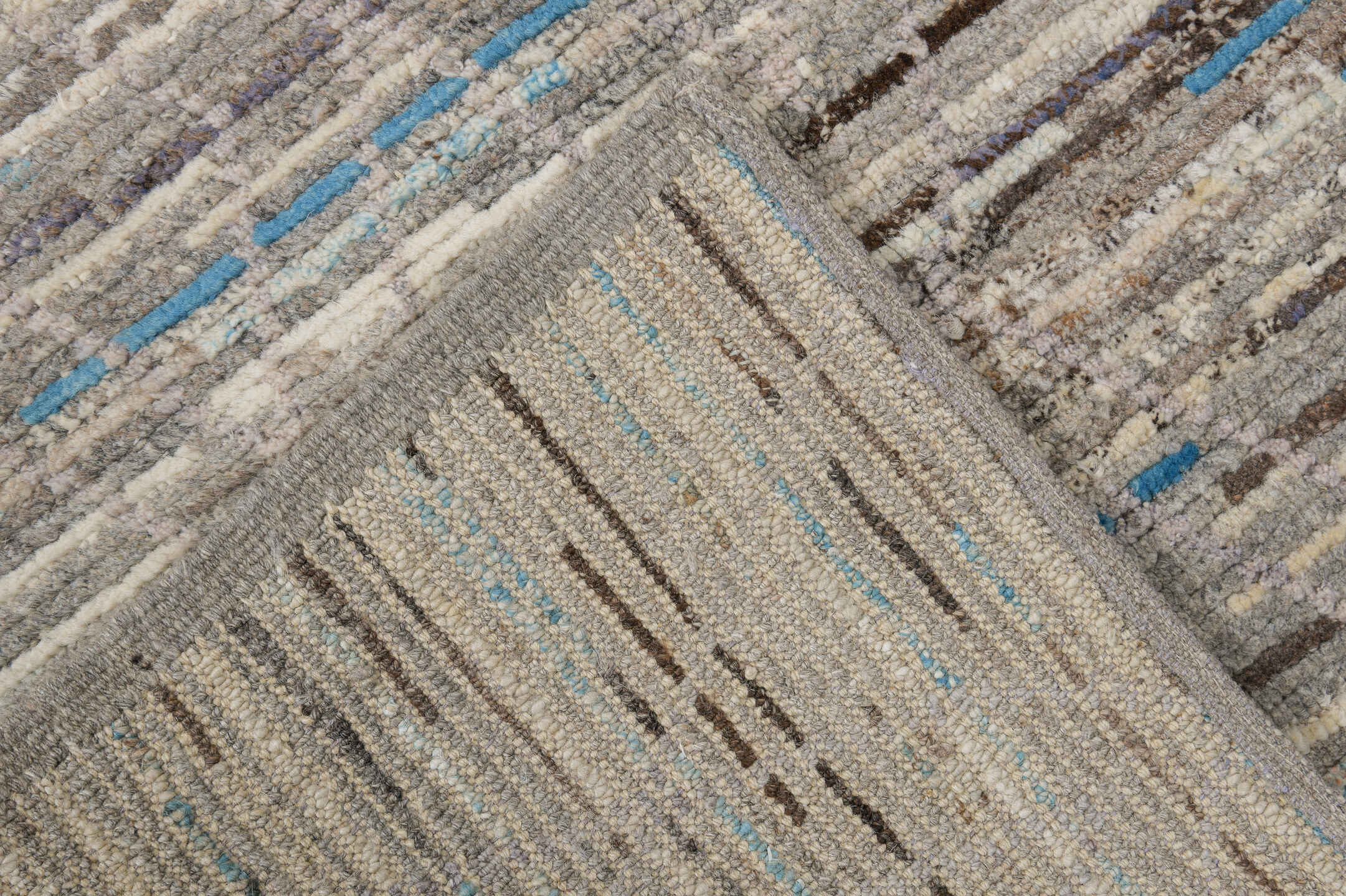 3' x 12' one-of-a-kind handmade vintage Tulu runner rug. Color palette: gray, ivory, taupe, charcoal, sky blue, brown, beige