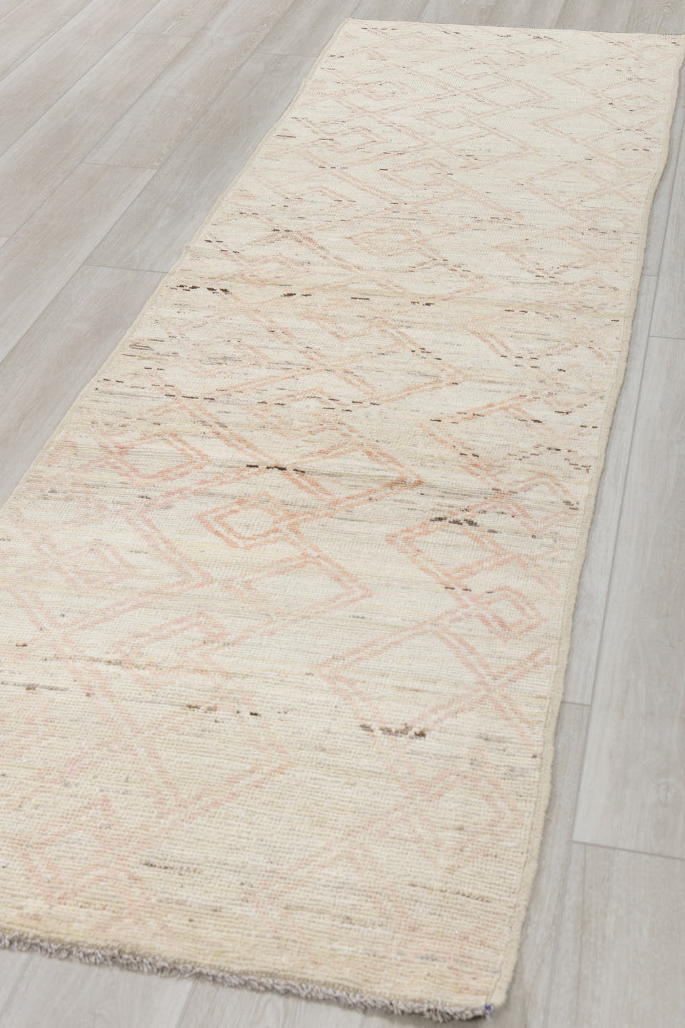 2' x 10' one-of-a-kind handmade vintage Tulu runner rug. Color palette: ivory, cream, blush, taupe, charcoal, pink, beige