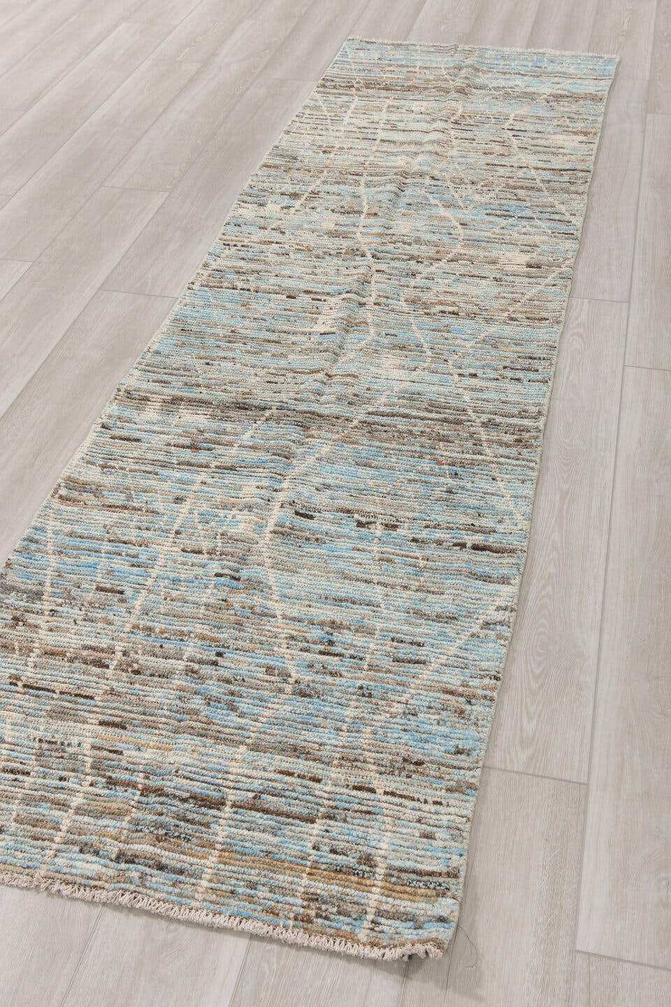 2' x 9' one-of-a-kind handmade vintage Tulu runner rug. Color palette: ivory, taupe, light blue, gray, cream, beige