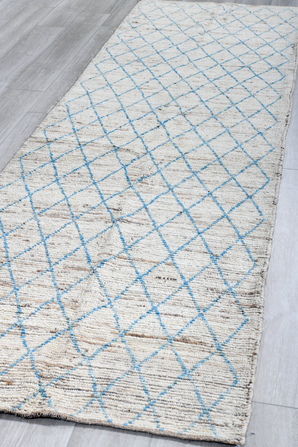 3' x 11' one-of-a-kind handmade vintage Tulu runner rug. Color palette: ivory, sky blue, taupe, gray, light blue, beige
