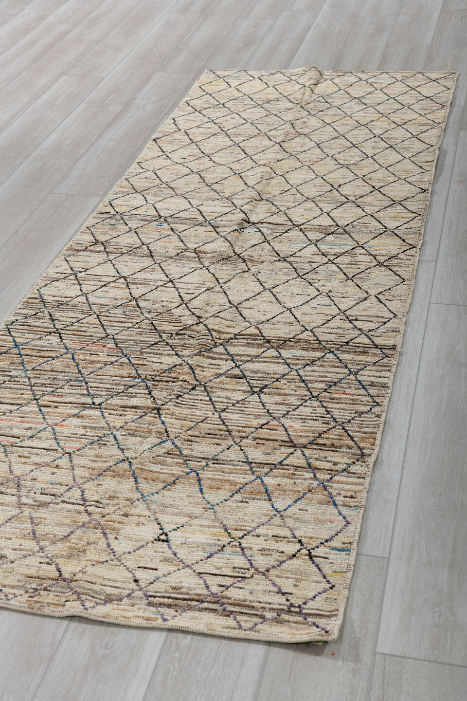 3' x 10' one-of-a-kind handmade vintage Tulu runner rug. Color palette: ivory, charcoal, taupe, brown, camel, faded blue