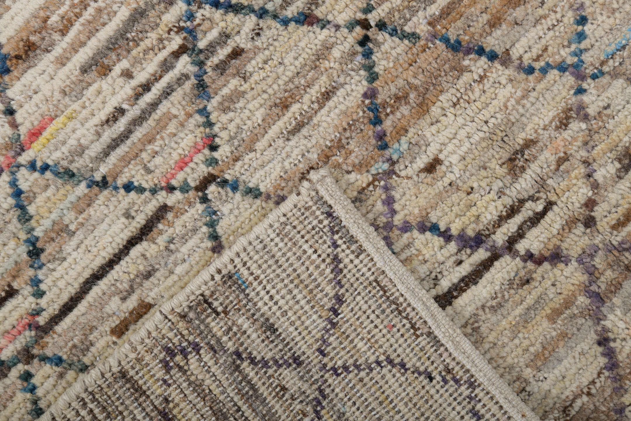 3' x 10' one-of-a-kind handmade vintage Tulu runner rug. Color palette: ivory, charcoal, taupe, brown, camel, faded blue