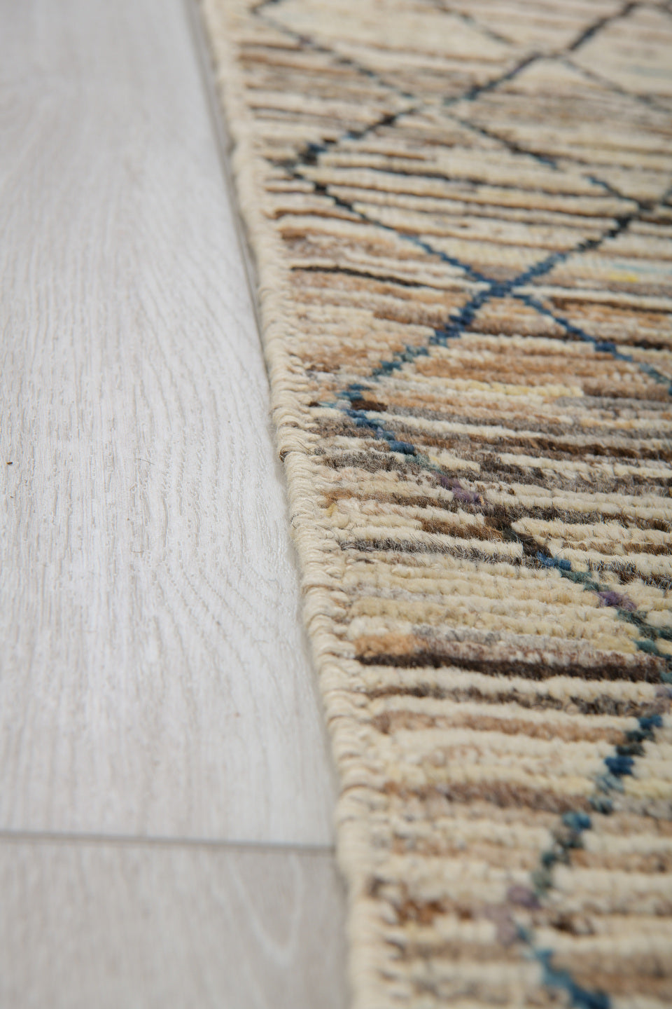 3' x 10' one-of-a-kind handmade vintage Tulu runner rug. Color palette: ivory, charcoal, taupe, brown, camel, faded blue