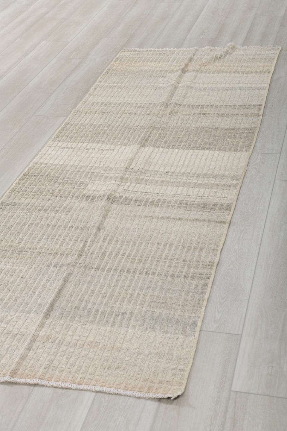 3' x 9' one-of-a-kind handmade vintage Tulu runner rug. Color palette: ivory, taupe, gray, cream, beige