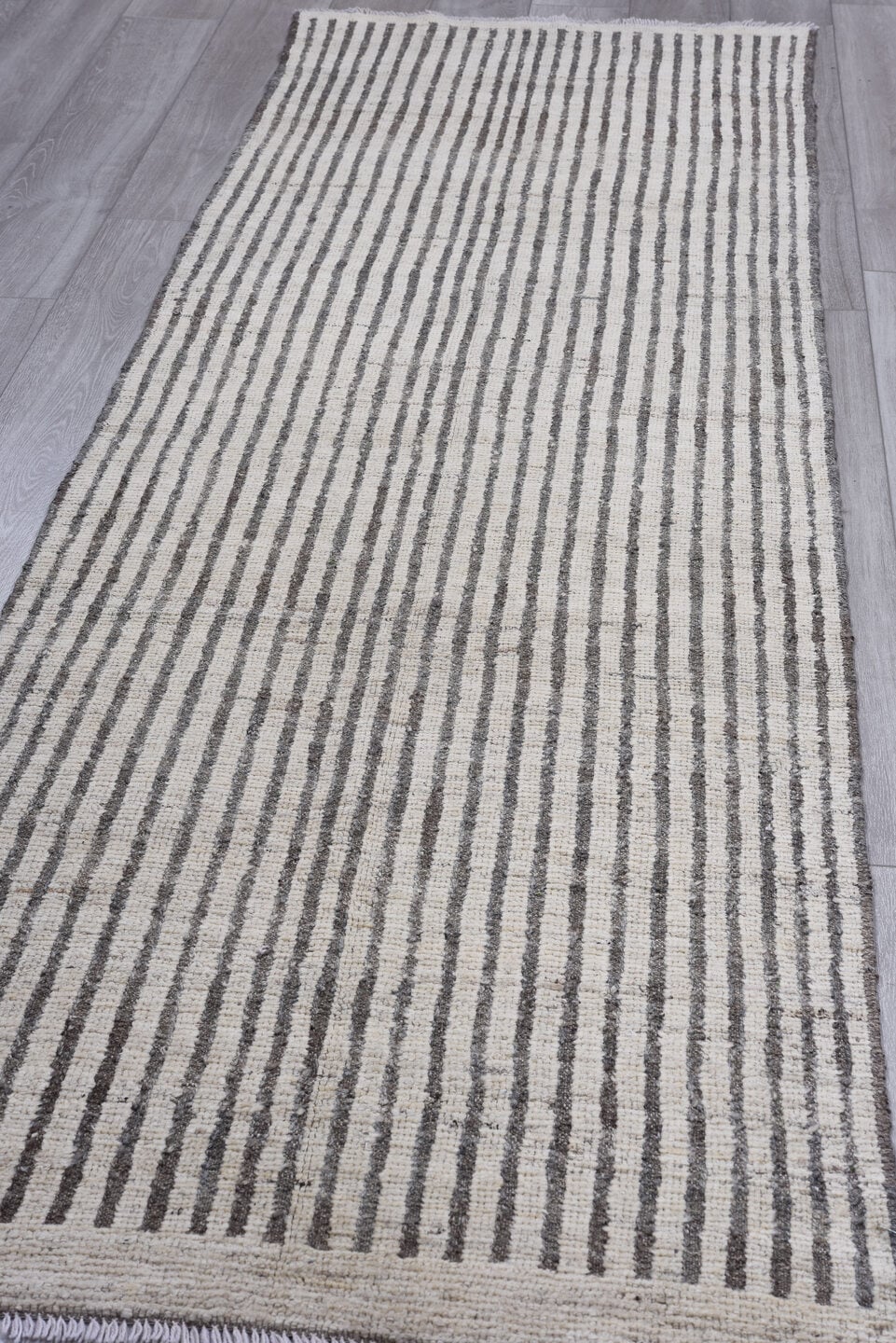 3' x 10' one-of-a-kind handmade vintage Tulu runner rug. Color palette: ivory, charcoal, taupe, gray, black, beige