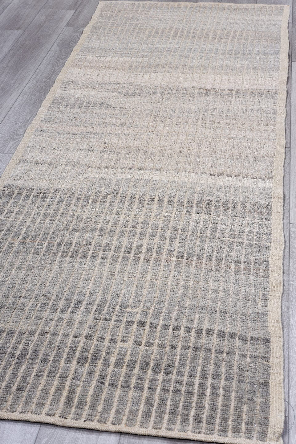 3' x 9' one-of-a-kind handmade vintage Tulu runner rug. Color palette: ivory, gray, taupe, charcoal, beige, black