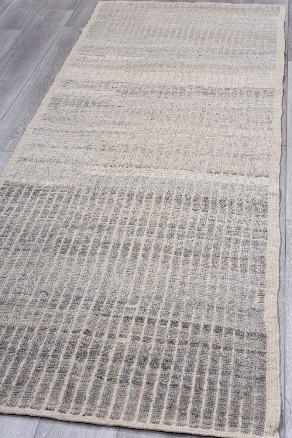 3' x 9' one-of-a-kind handmade vintage Tulu runner rug. Color palette: ivory, gray, taupe, charcoal, beige, black