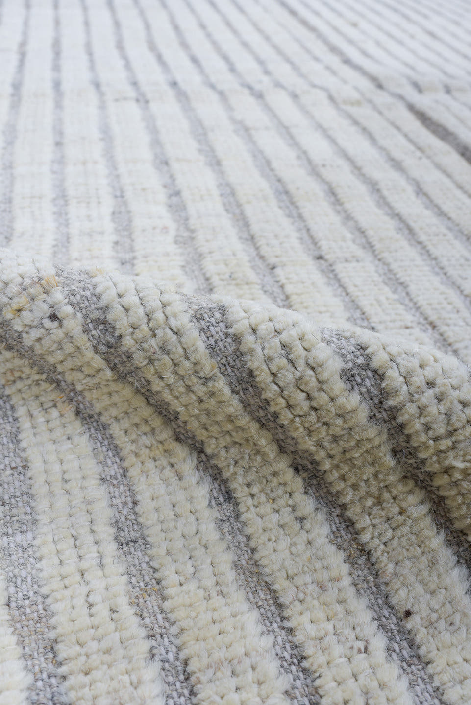 3' x 9' one-of-a-kind handmade vintage Tulu runner rug. Color palette: ivory, pale blue, light gray, light blue