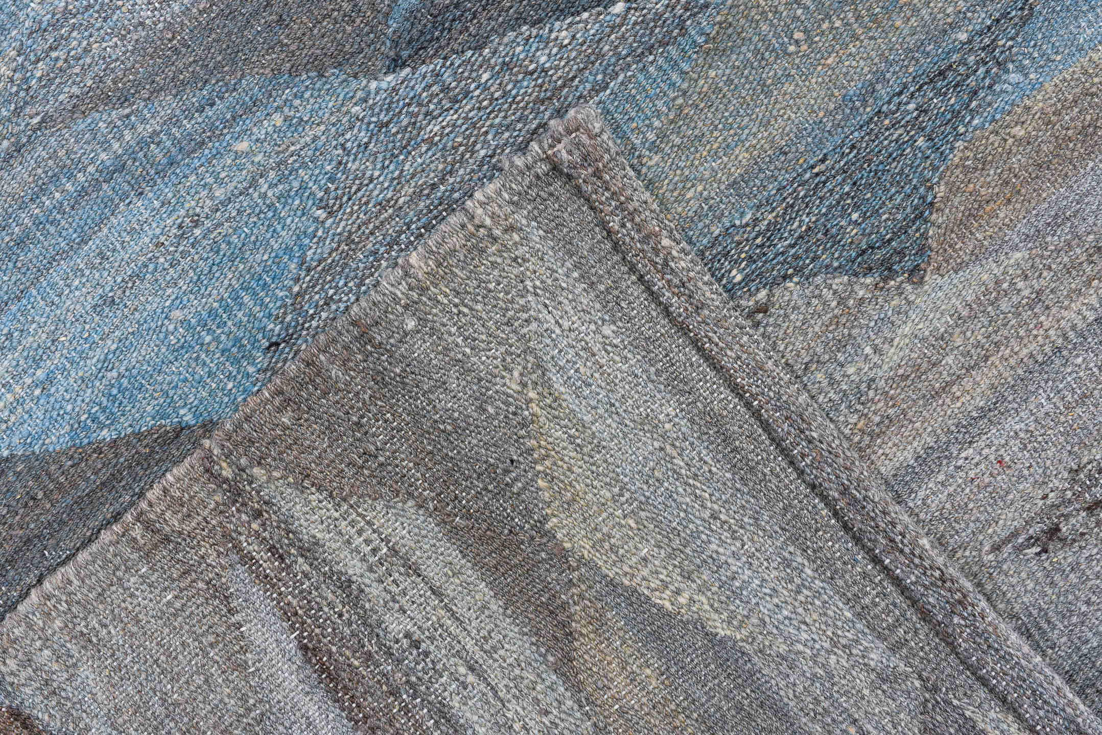 2' x 10' one-of-a-kind handmade vintage Tulu runner rug. Color palette: blue, gray, light blue, light gray, off-white