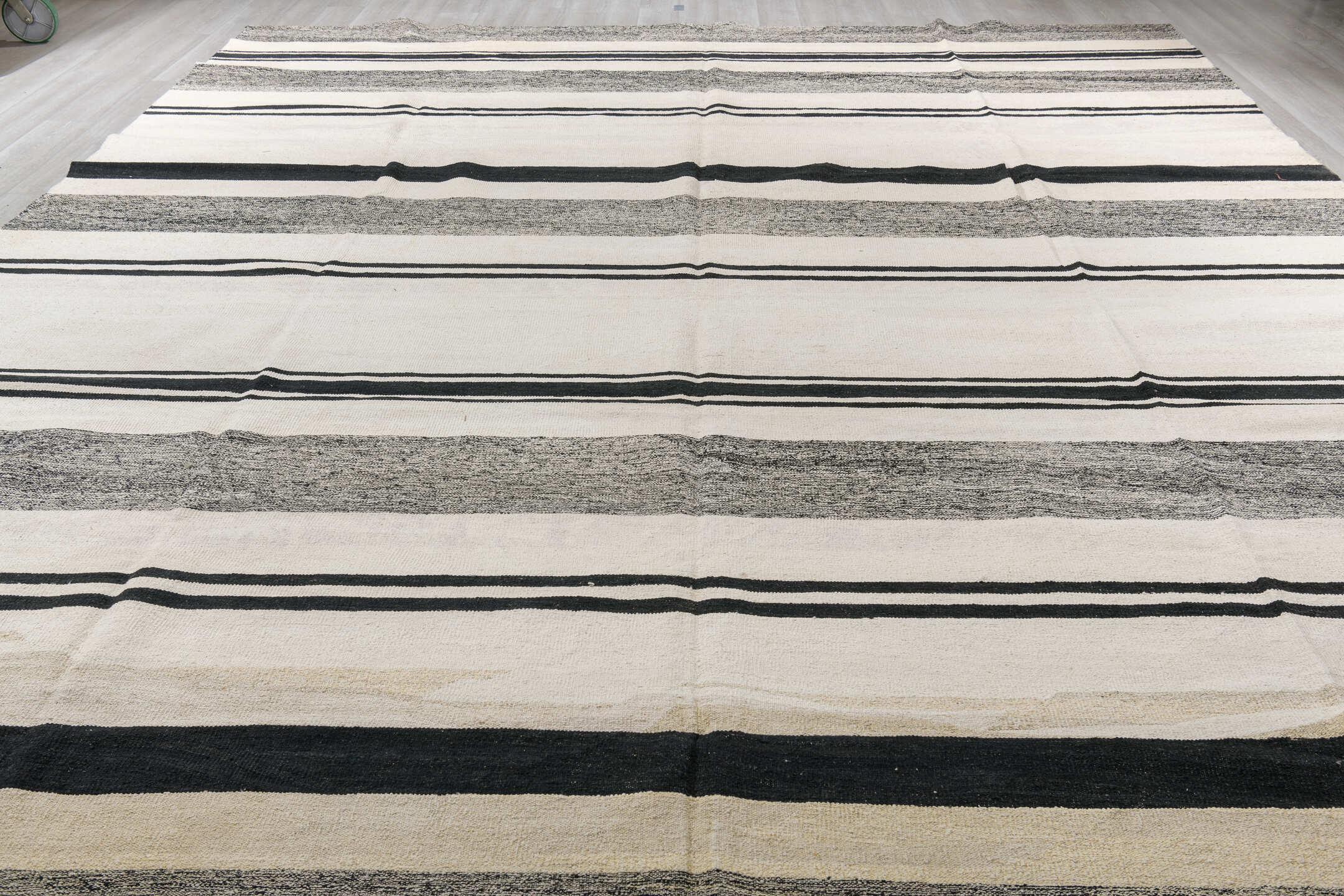 13' x 16' one-of-a-kind handmade vintage Kilim oversize rug. Color palette: black, brown, charcoal, dark gray, dim gray