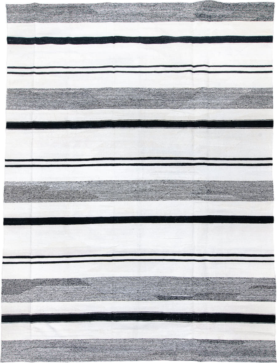 11' x 15' one-of-a-kind handmade vintage Tulu oversize rug. Color palette: ivory, charcoal, black, gray