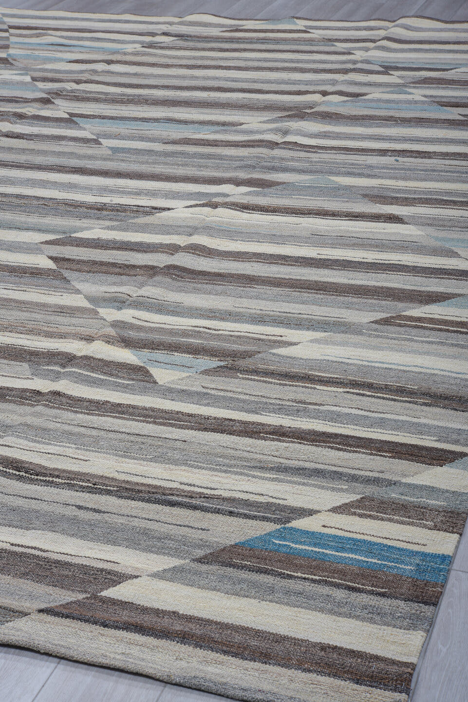9' x 13' one-of-a-kind handmade vintage Tulu large size rug. Color palette: gray, ivory, charcoal, pale_blue, taupe, black