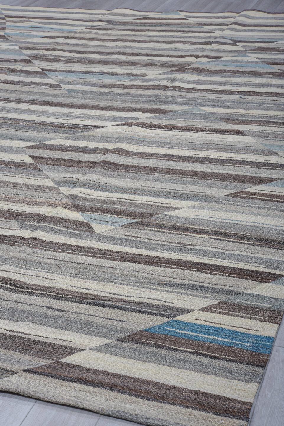 9' x 13' one-of-a-kind handmade vintage Tulu large size rug. Color palette: gray, ivory, charcoal, pale_blue, taupe, black
