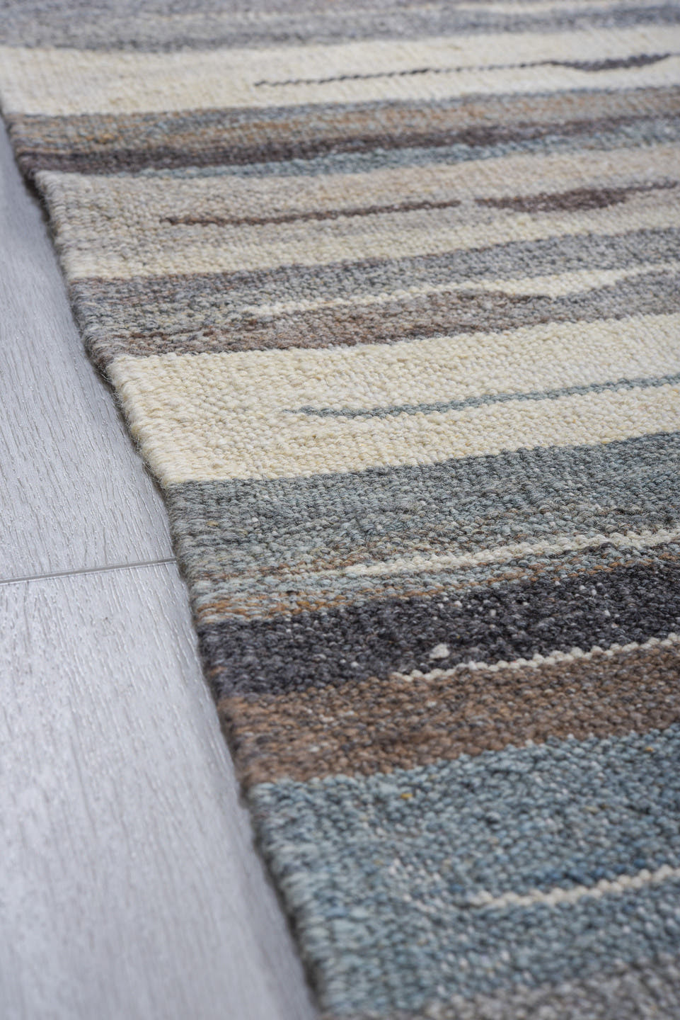 9' x 13' one-of-a-kind handmade vintage Tulu large size rug. Color palette: gray, ivory, charcoal, pale_blue, taupe, black