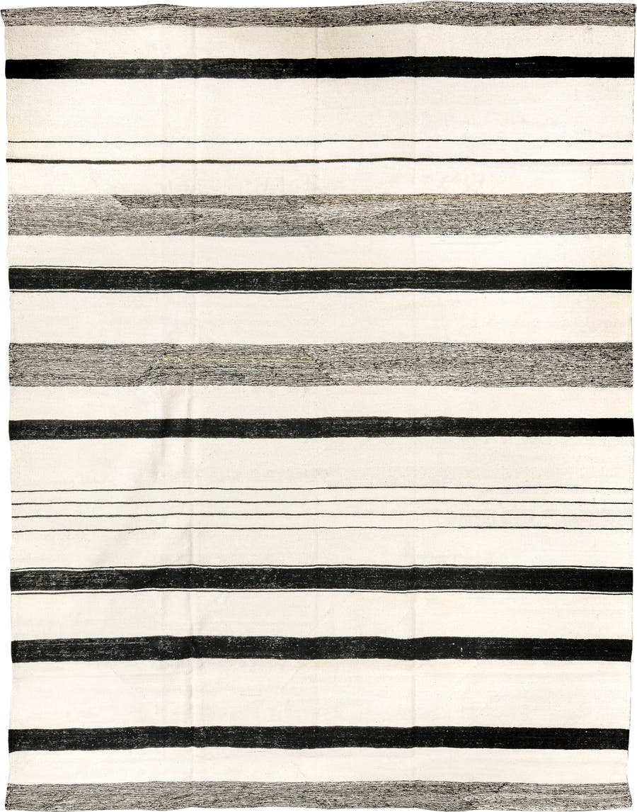 9' x 11' one-of-a-kind handmade vintage Tulu large size rug. Color palette: ivory, charcoal, gray, black