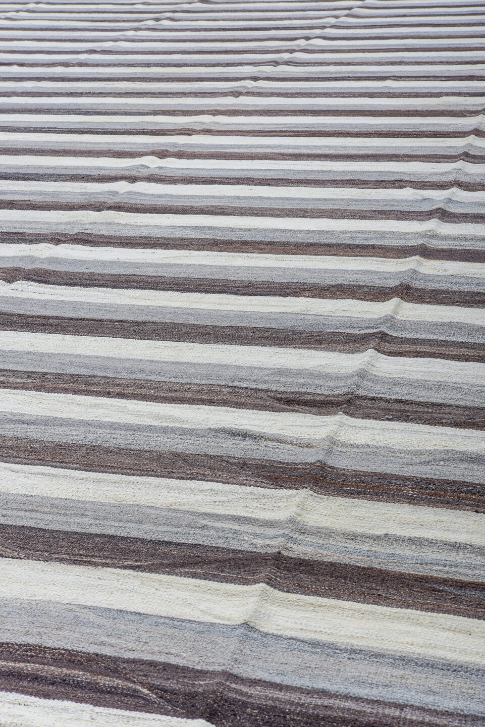 14' x 20' one-of-a-kind handmade vintage Tulu oversize rug. Color palette: ivory, taupe, brown, gray, charcoal, beige, black