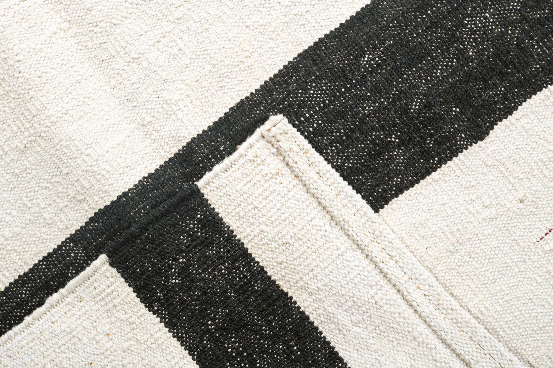 14' x 18' one-of-a-kind handmade vintage Tulu oversize rug. Color palette: ivory, charcoal, gray, black