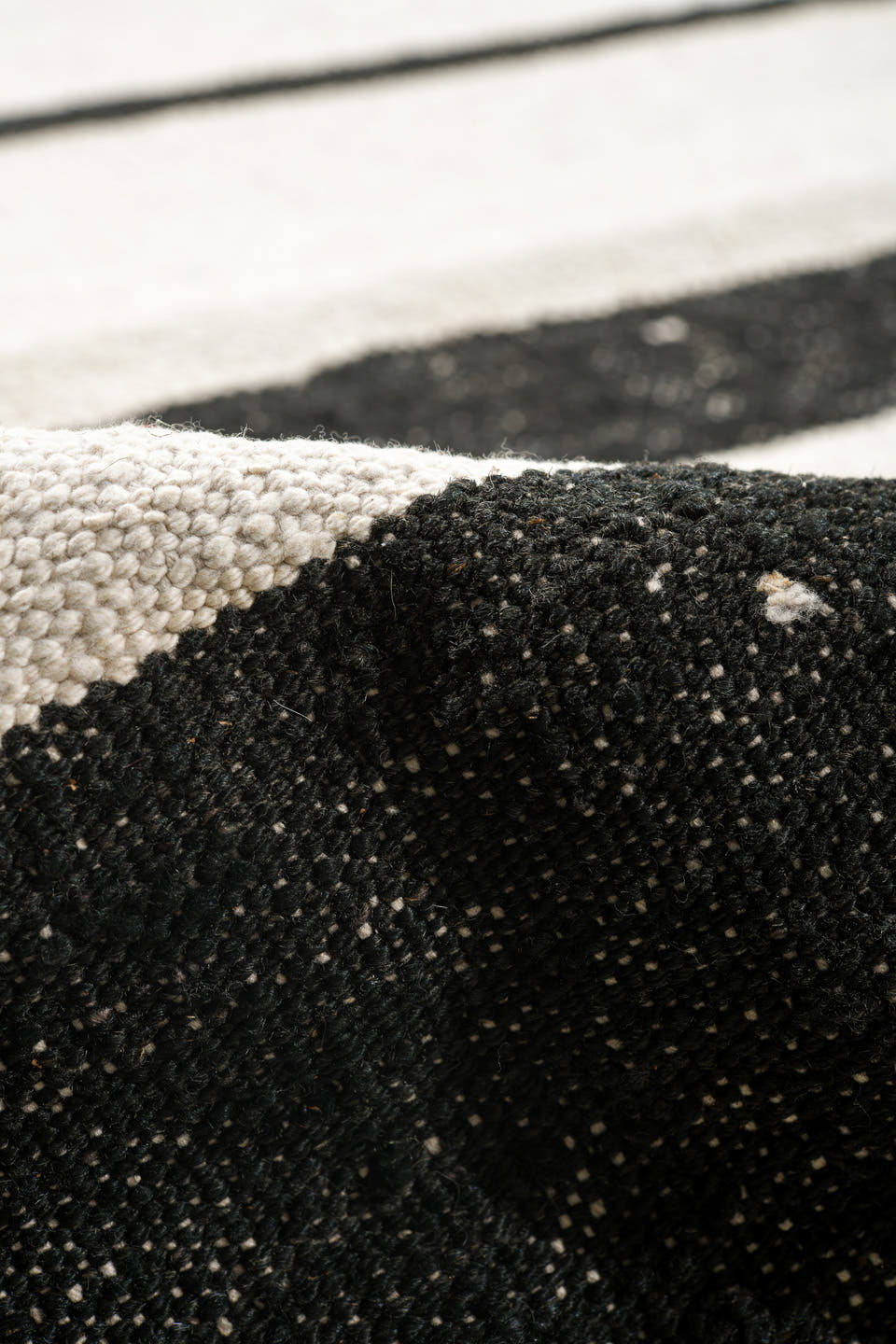14' x 18' one-of-a-kind handmade vintage Tulu oversize rug. Color palette: ivory, charcoal, gray, black