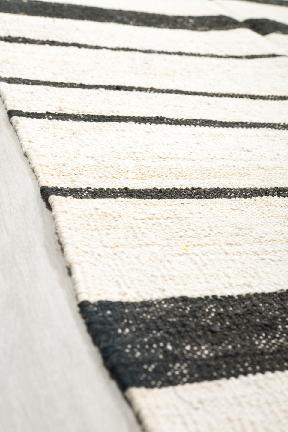 14' x 18' one-of-a-kind handmade vintage Tulu oversize rug. Color palette: ivory, charcoal, gray, black