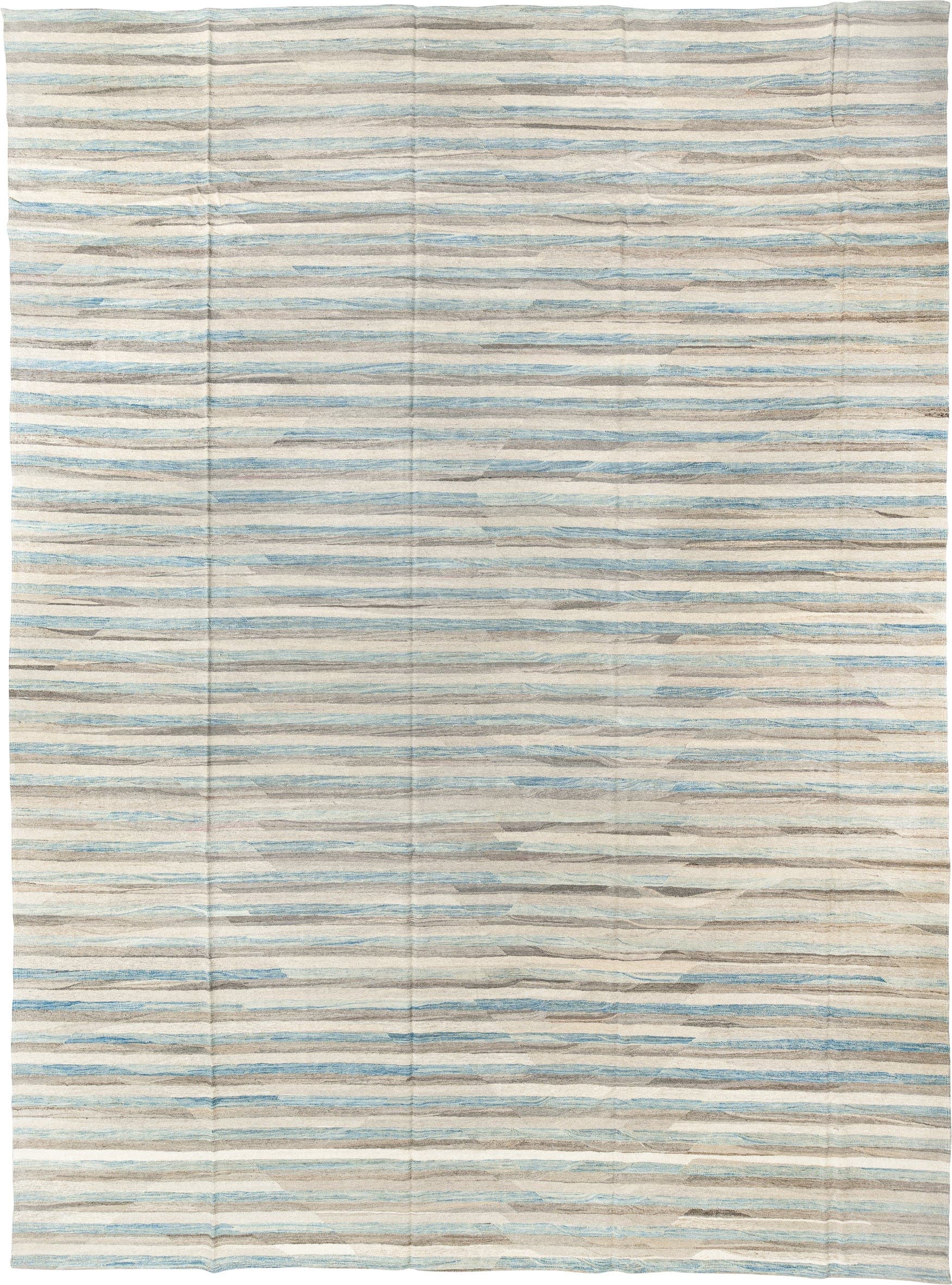 14' x 19' one-of-a-kind handmade vintage Tulu oversize rug. Color palette: ivory, pale blue, taupe, cream, gray, light blue