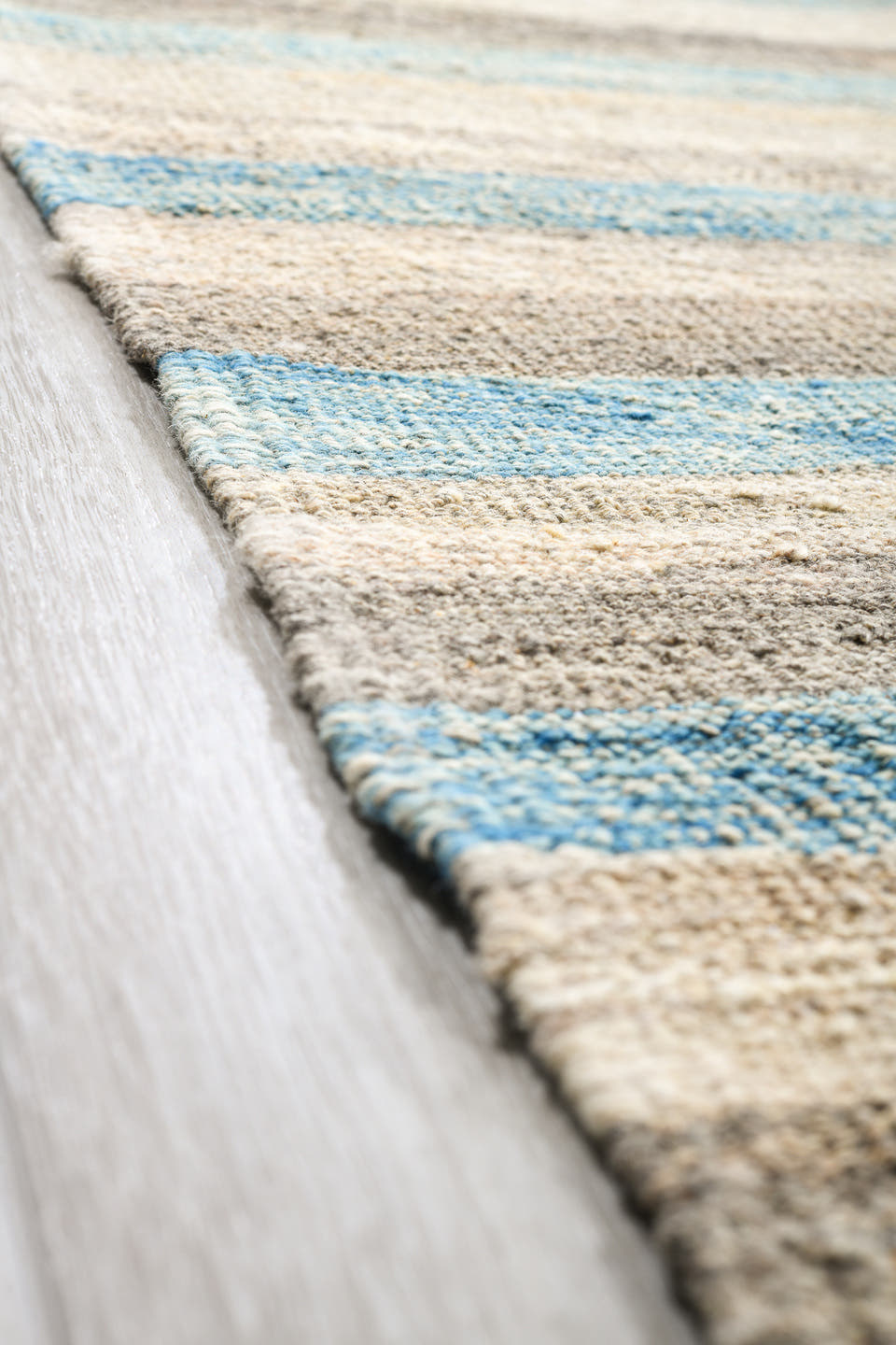 14' x 19' one-of-a-kind handmade vintage Tulu oversize rug. Color palette: ivory, pale blue, taupe, cream, gray, light blue