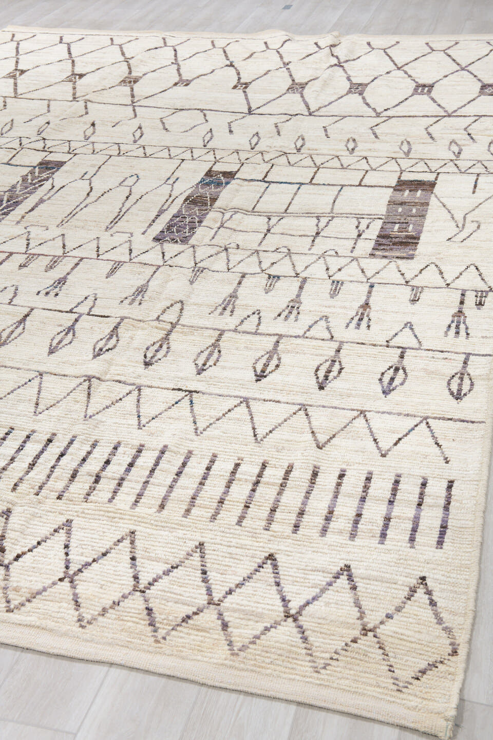 10' x 14' one-of-a-kind handmade vintage Tulu large size rug. Color palette: ivory, charcoal, taupe, gray, black, beige