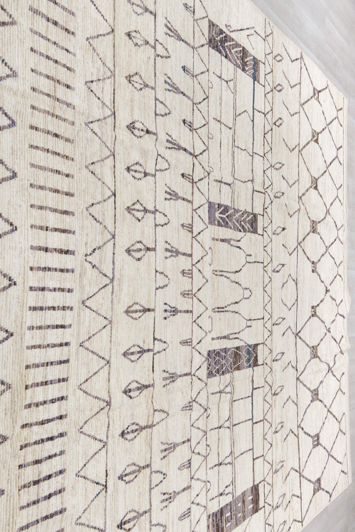 10' x 14' one-of-a-kind handmade vintage Tulu large size rug. Color palette: ivory, charcoal, taupe, gray, black, beige