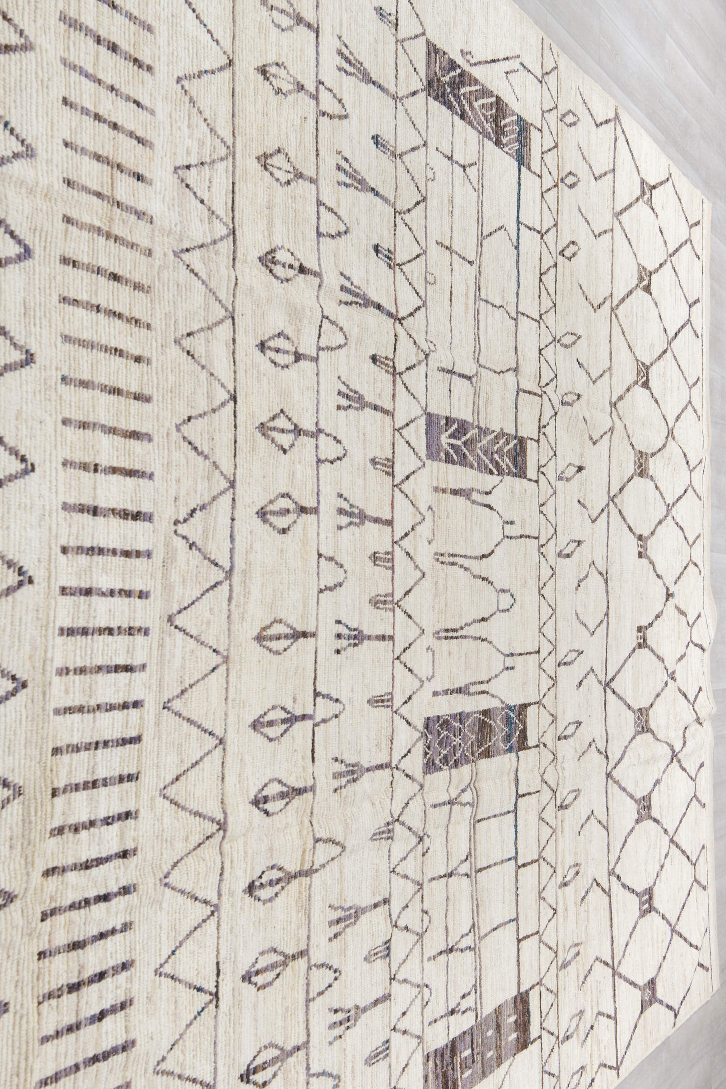 10' x 14' one-of-a-kind handmade vintage Tulu large size rug. Color palette: ivory, charcoal, taupe, gray, black, beige