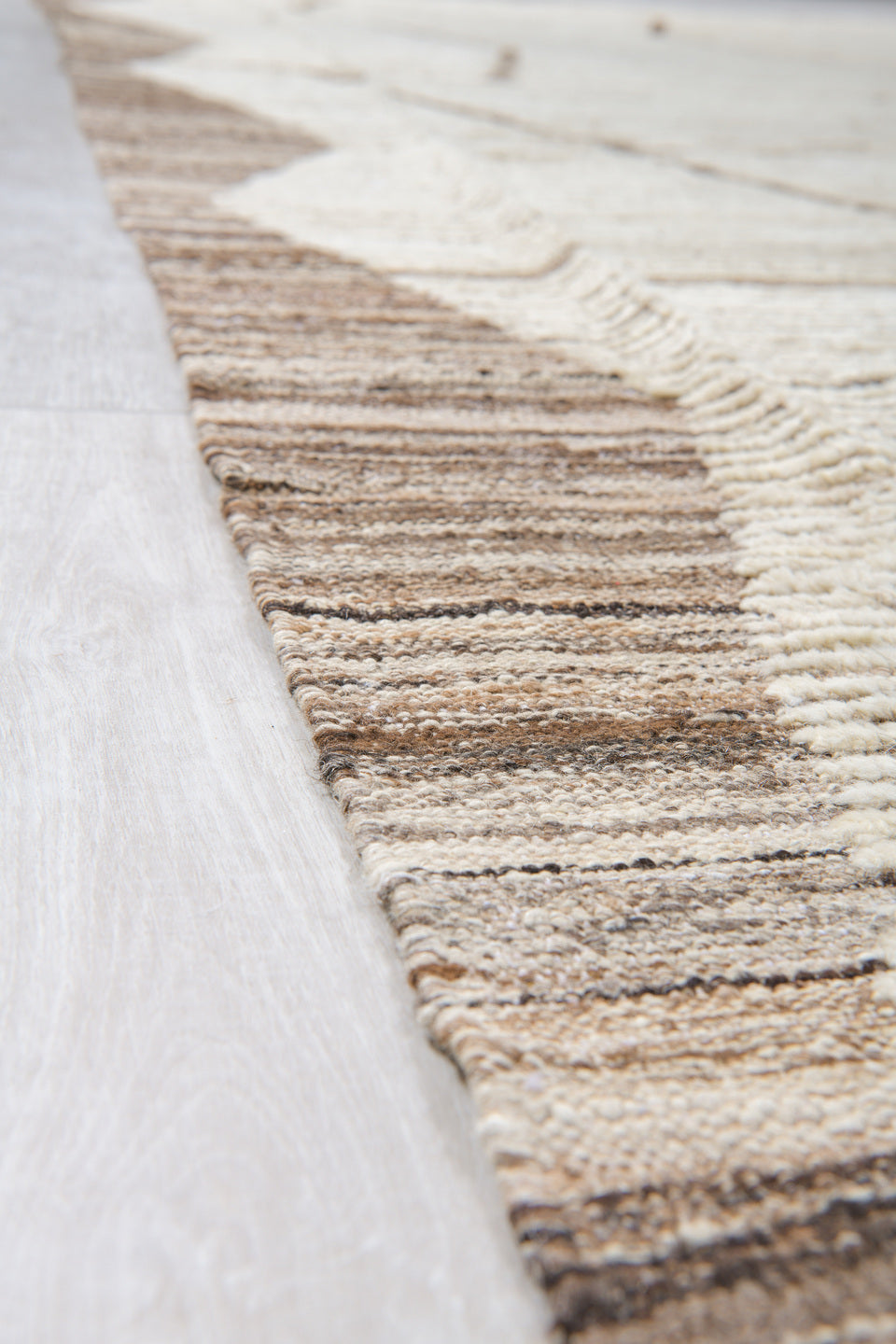 11' x 13' one-of-a-kind handmade vintage Tulu oversize rug. Color palette: dark gray, gray, light gray, linen, off-white