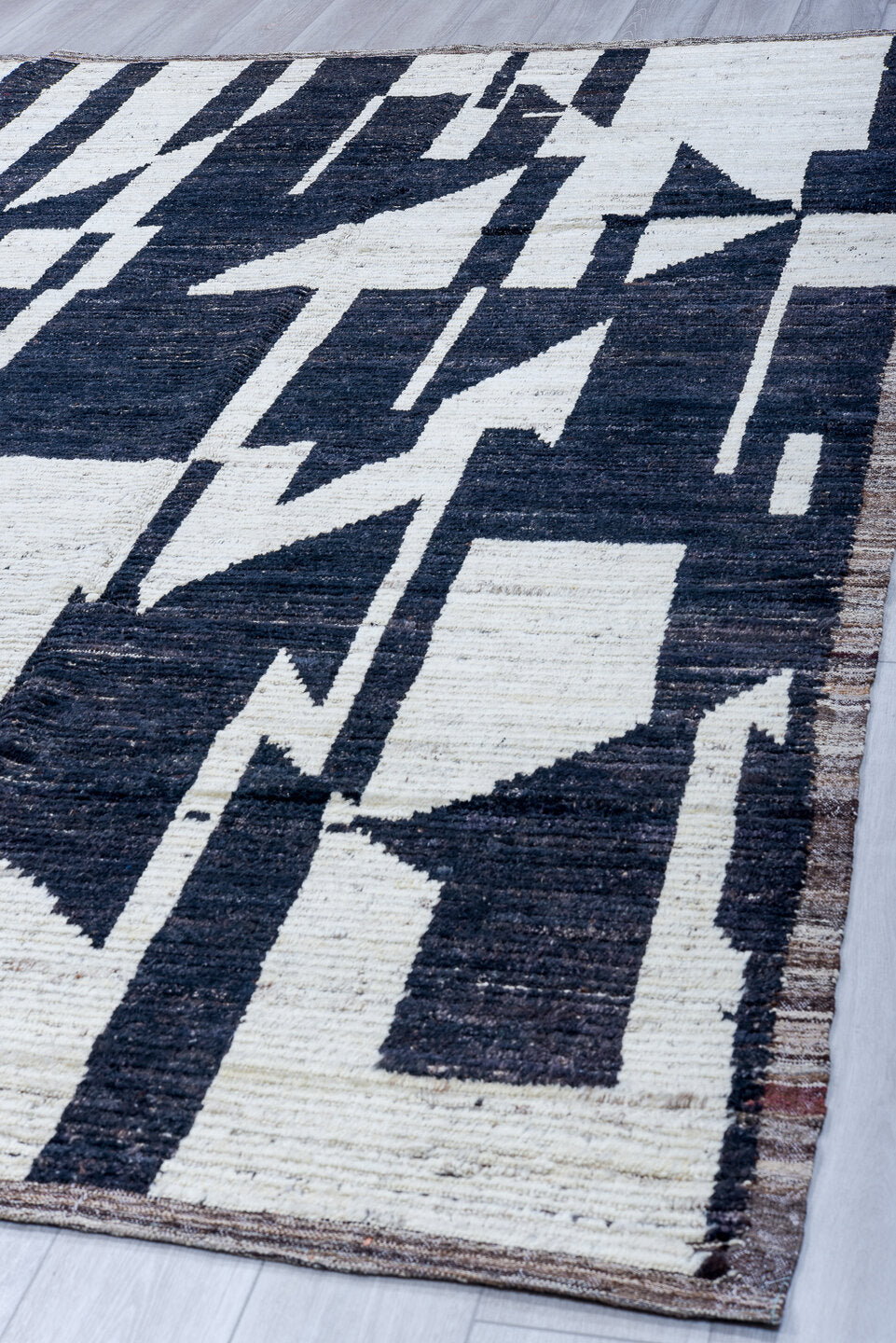 9' x 11' one-of-a-kind handmade vintage Tulu large size rug. Color palette: ivory, charcoal, slate, taupe, gray, black