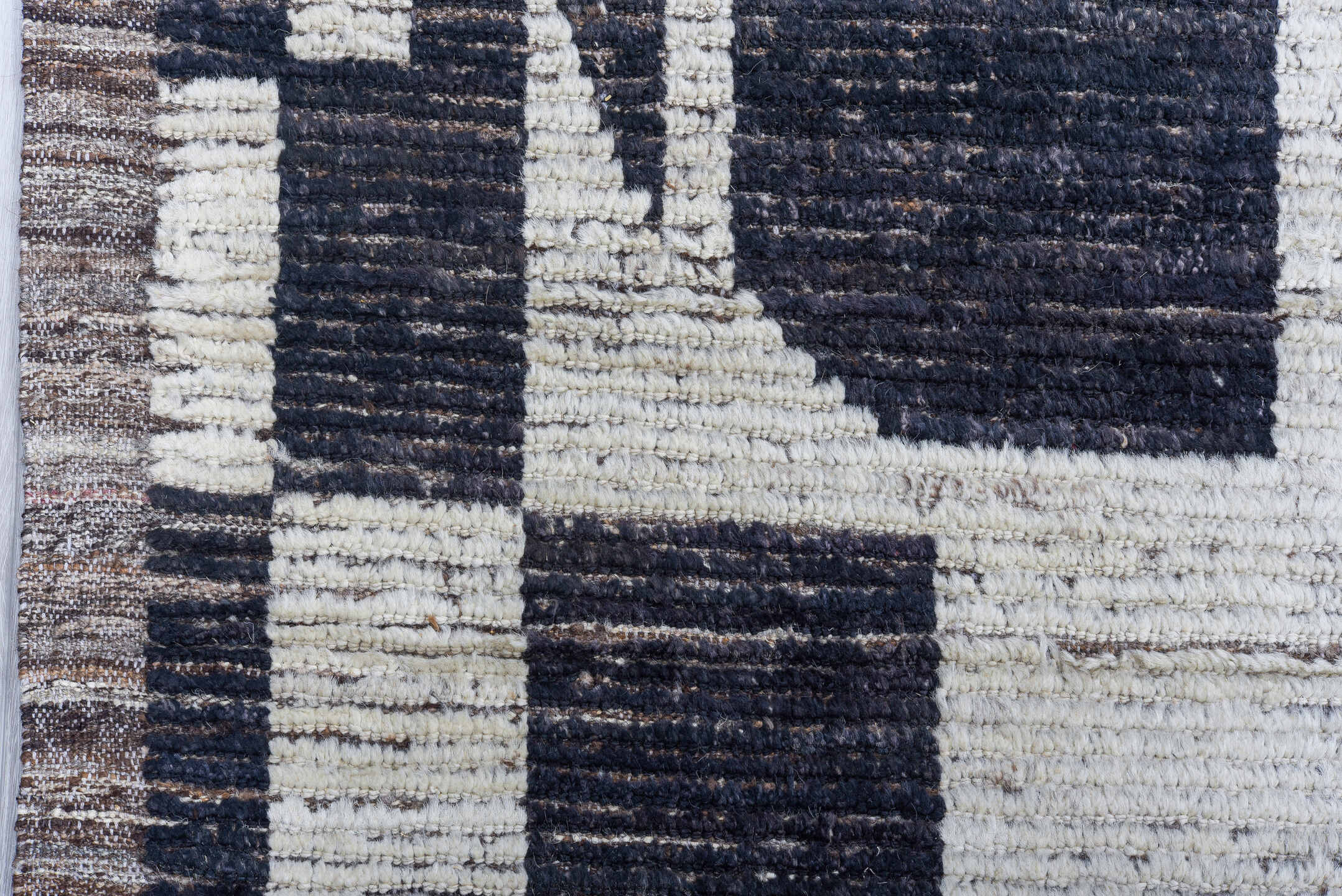 9' x 11' one-of-a-kind handmade vintage Tulu large size rug. Color palette: ivory, charcoal, slate, taupe, gray, black