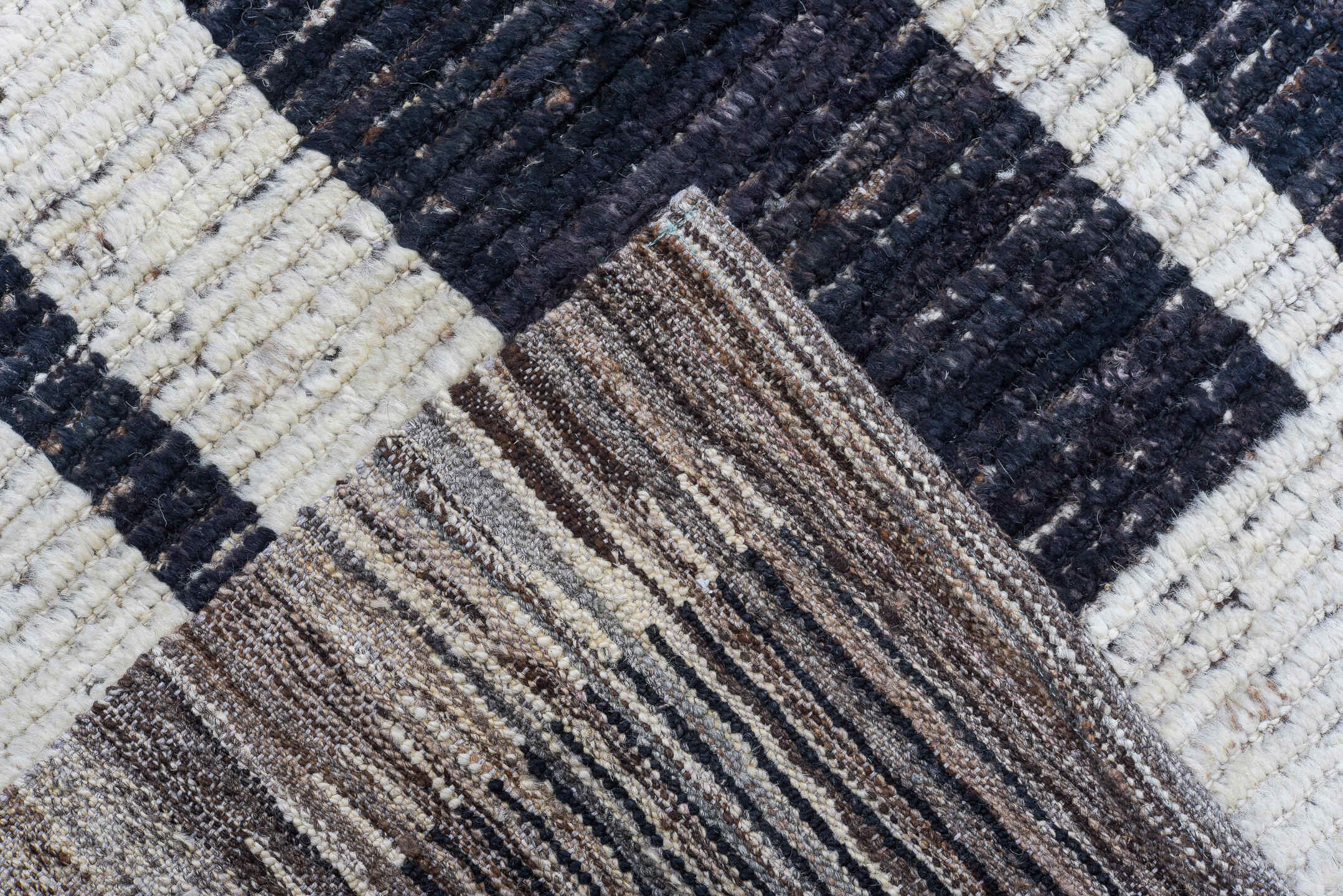 9' x 11' one-of-a-kind handmade vintage Tulu large size rug. Color palette: ivory, charcoal, slate, taupe, gray, black