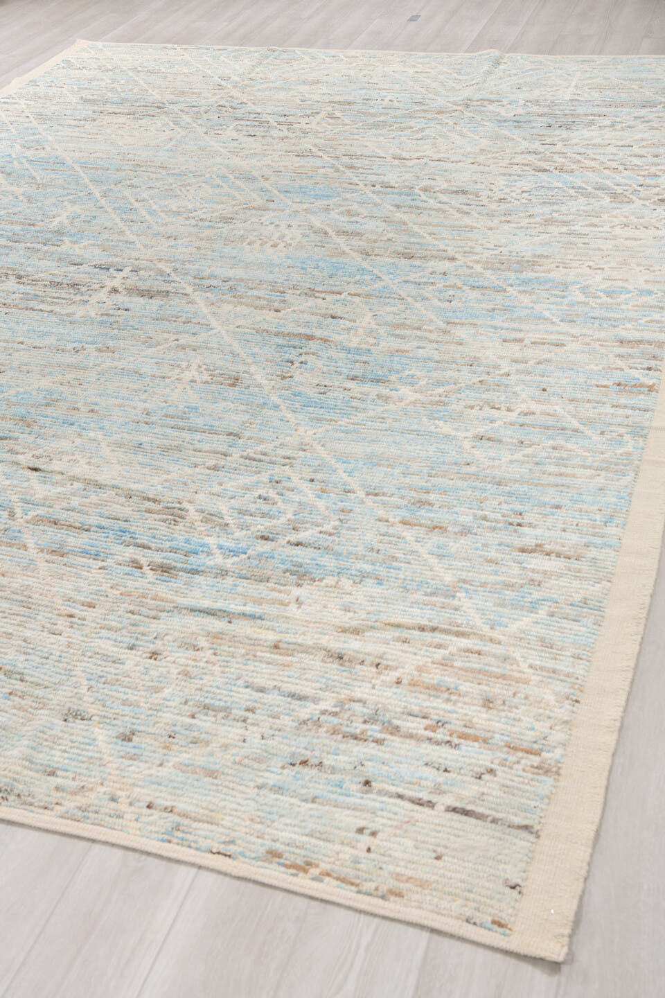 10' x 13' one-of-a-kind handmade vintage Tulu large size rug. Color palette: ivory, sky blue, taupe, beige, camel, brown
