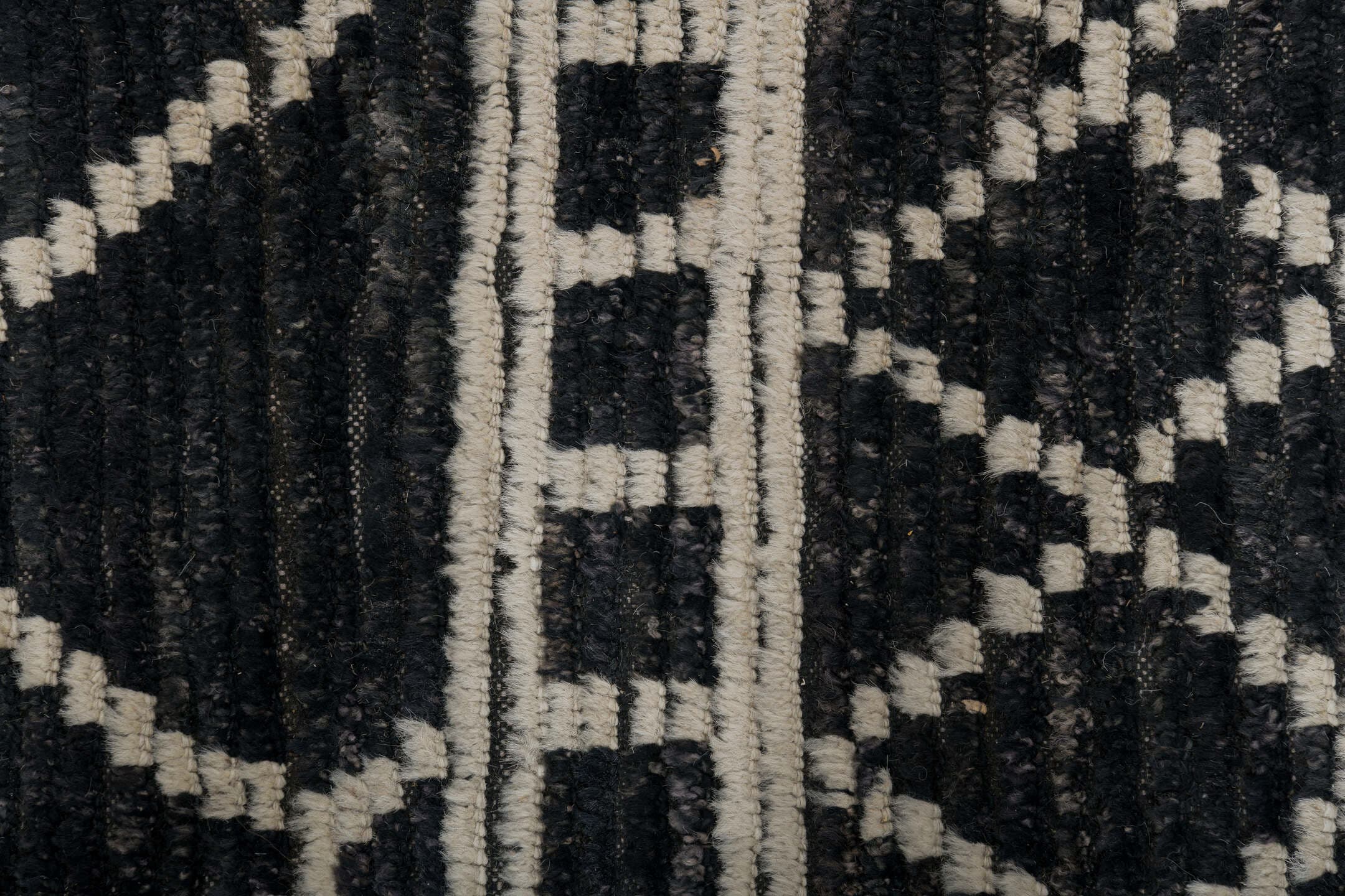 9' x 12' one-of-a-kind handmade vintage Tulu large size rug. Color palette: charcoal, ivory, slate, ebony, gray, black