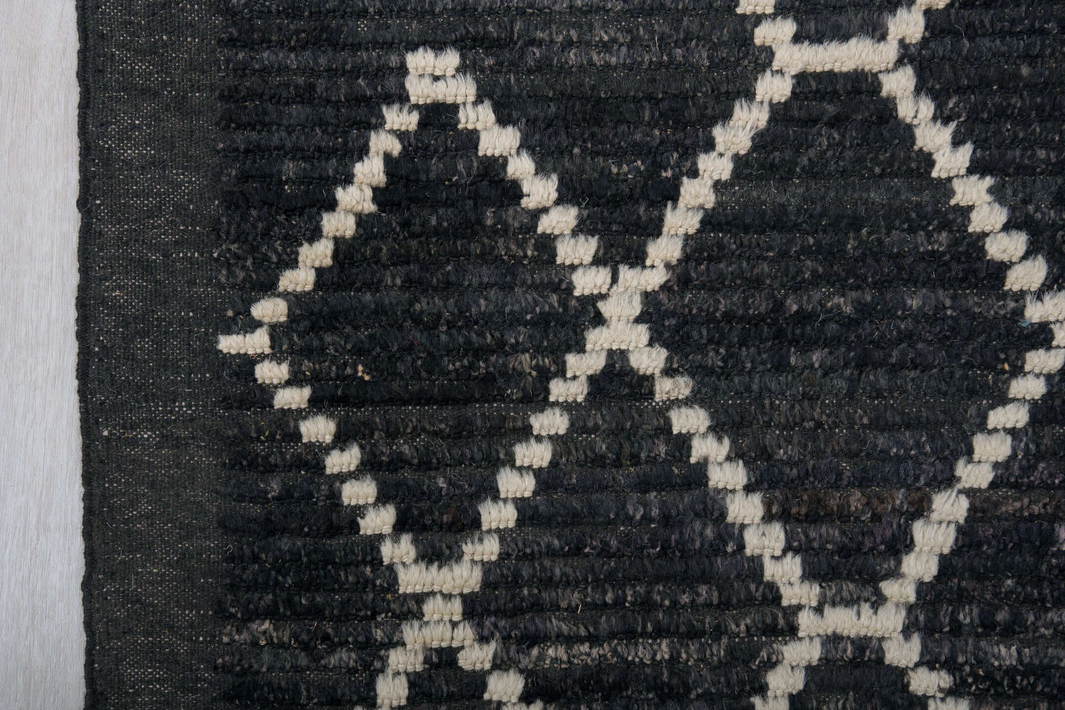 9' x 12' one-of-a-kind handmade vintage Tulu large size rug. Color palette: charcoal, ivory, slate, ebony, gray, black