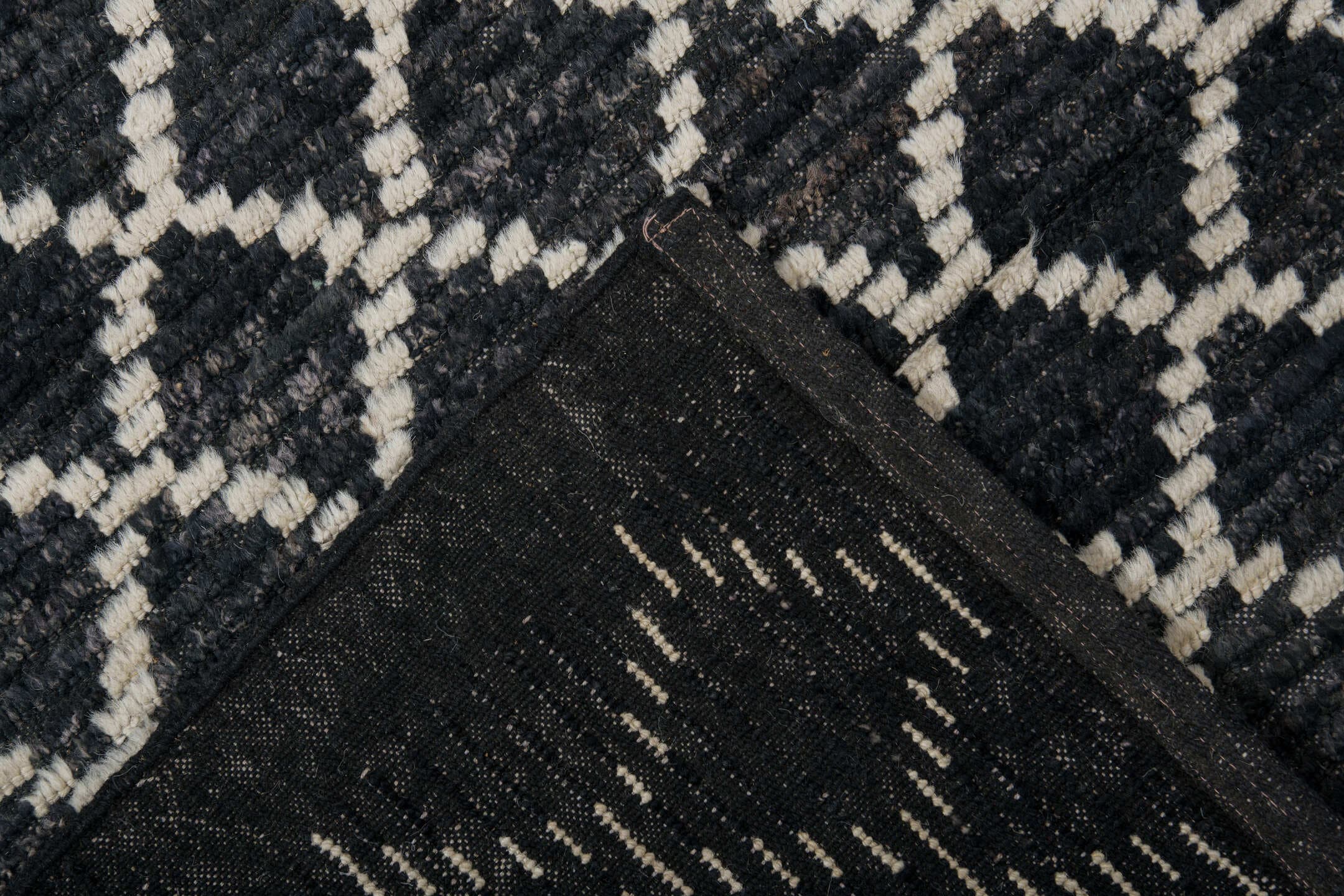 9' x 12' one-of-a-kind handmade vintage Tulu large size rug. Color palette: charcoal, ivory, slate, ebony, gray, black