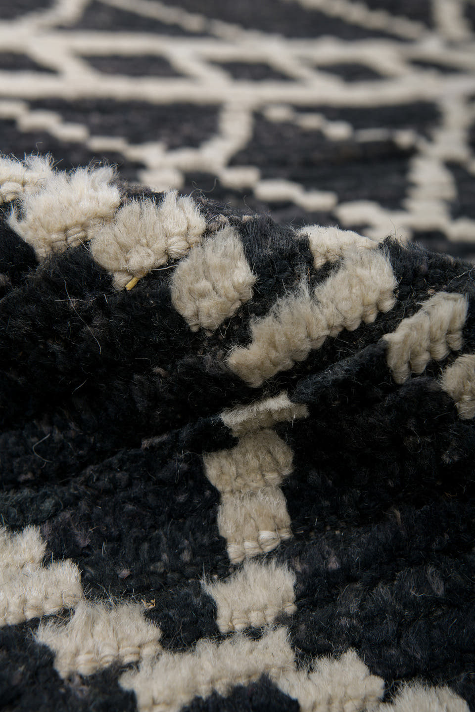 9' x 12' one-of-a-kind handmade vintage Tulu large size rug. Color palette: charcoal, ivory, slate, ebony, gray, black