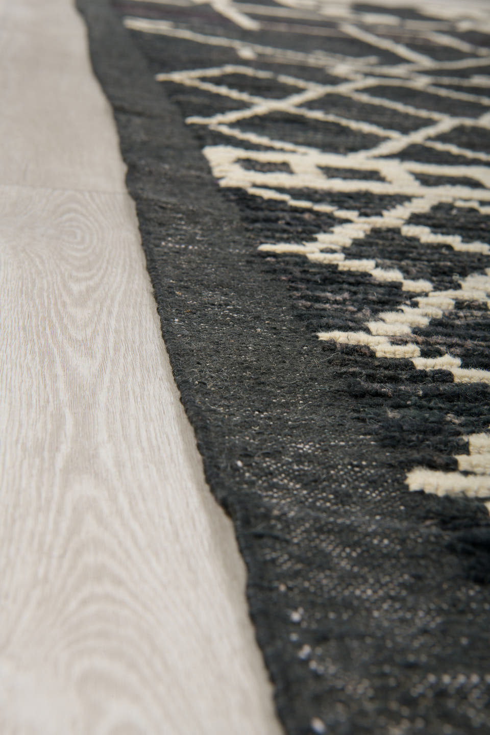 9' x 12' one-of-a-kind handmade vintage Tulu large size rug. Color palette: charcoal, ivory, slate, ebony, gray, black