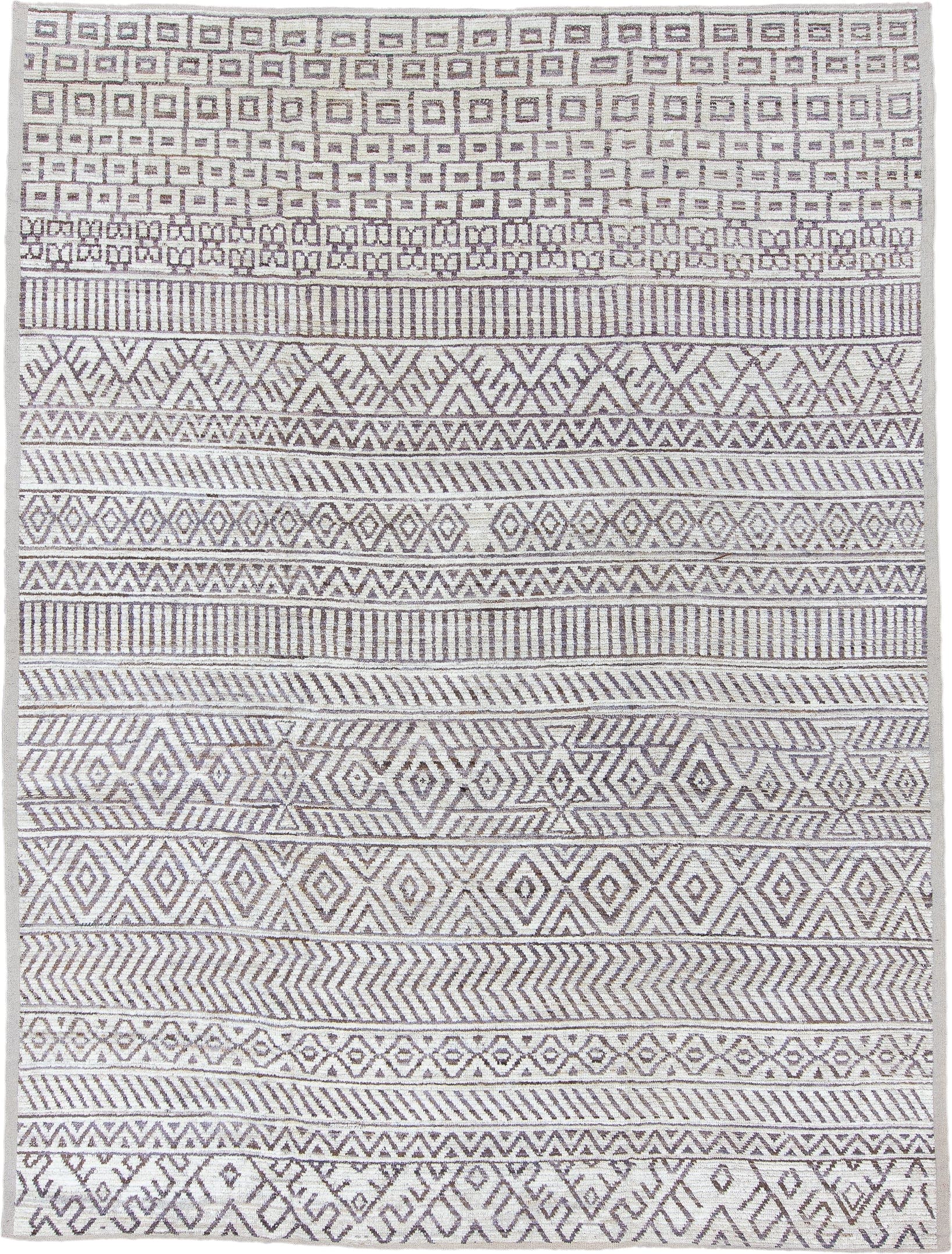 9' x 12' one-of-a-kind handmade vintage Tulu large size rug. Color palette: ivory, taupe, brown, charcoal, beige, gray