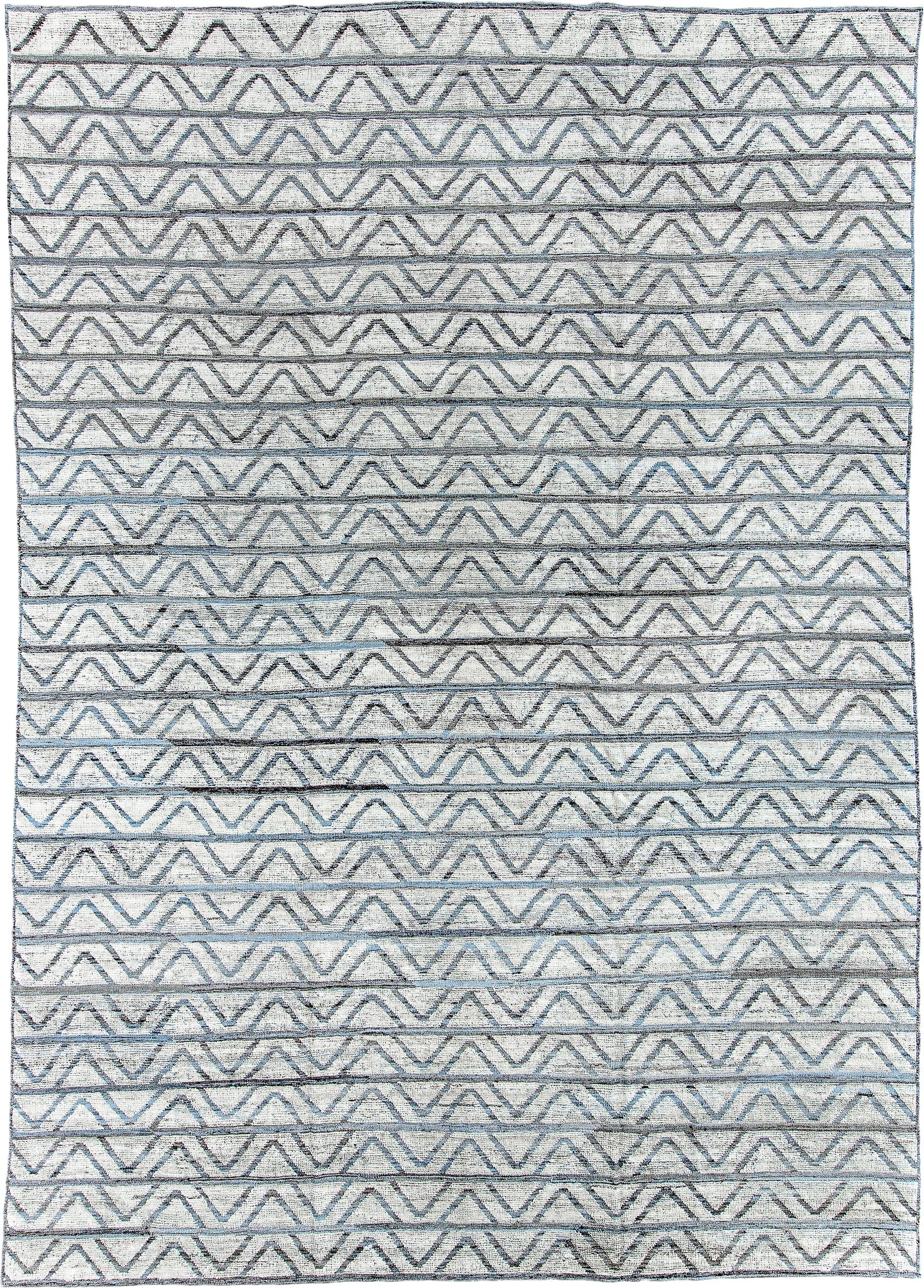 9' x 13' one-of-a-kind handmade vintage Tulu large size rug. Color palette: ivory, slate, blue, charcoal, gray, black