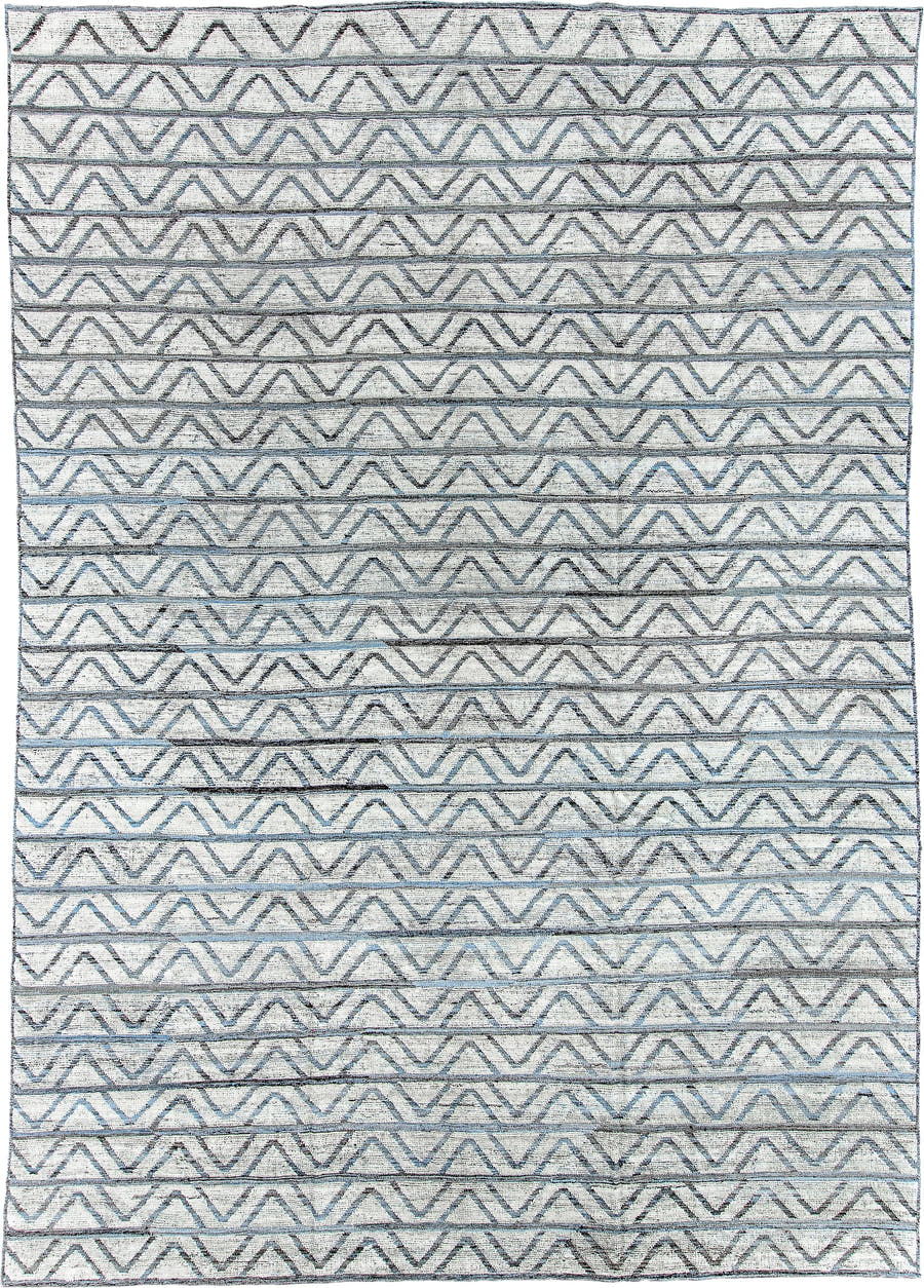 9' x 13' one-of-a-kind handmade vintage Tulu large size rug. Color palette: ivory, slate, blue, charcoal, gray, black