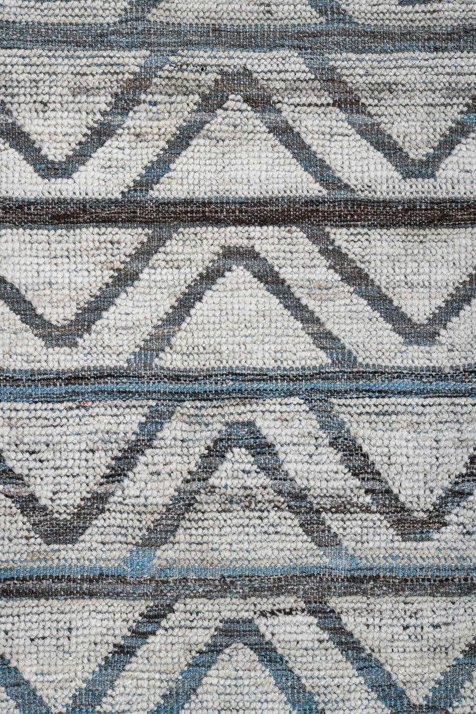 9' x 13' one-of-a-kind handmade vintage Tulu large size rug. Color palette: ivory, slate, blue, charcoal, gray, black