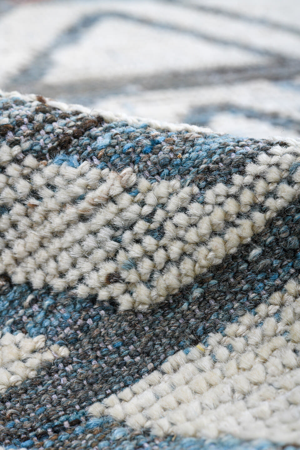 9' x 13' one-of-a-kind handmade vintage Tulu large size rug. Color palette: ivory, slate, blue, charcoal, gray, black