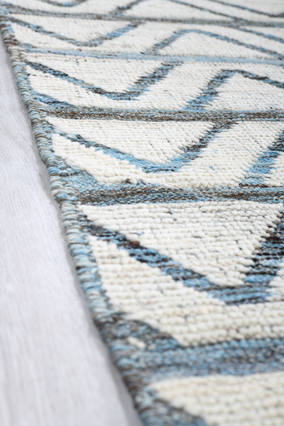 9' x 13' one-of-a-kind handmade vintage Tulu large size rug. Color palette: ivory, slate, blue, charcoal, gray, black