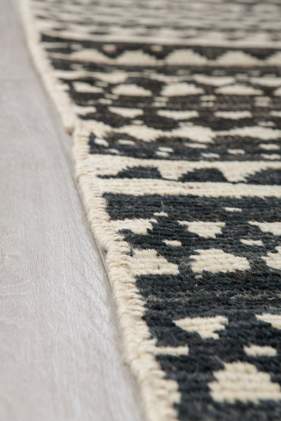 10' x 13' one-of-a-kind handmade vintage Tulu large size rug. Color palette: black, blue, brown, charcoal, dark gray