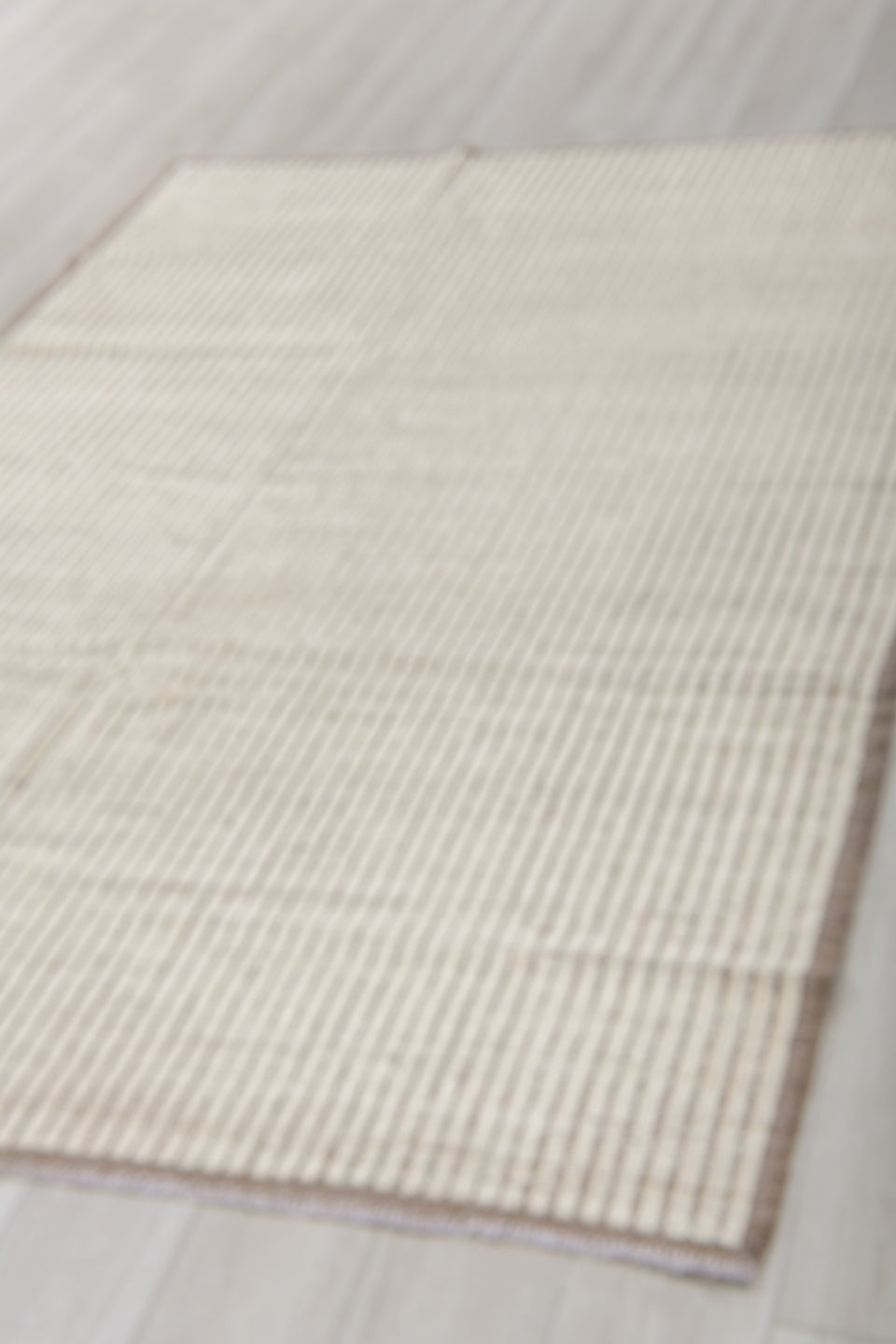 5' x 8' one-of-a-kind handmade vintage Tulu medium size rug. Color palette: ivory, taupe, brown, cream, beige, gray