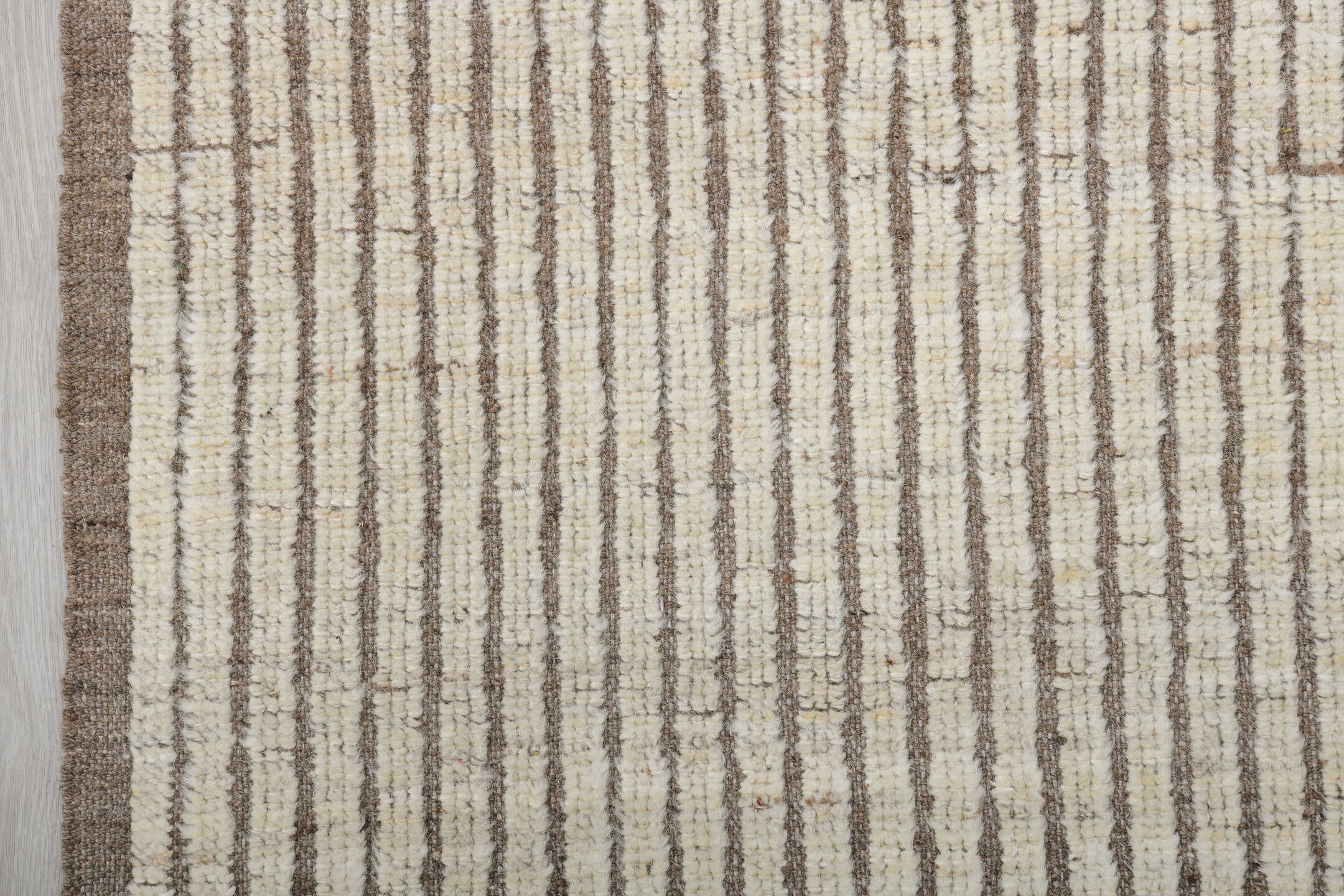 5' x 8' one-of-a-kind handmade vintage Tulu medium size rug. Color palette: ivory, taupe, brown, cream, beige, gray